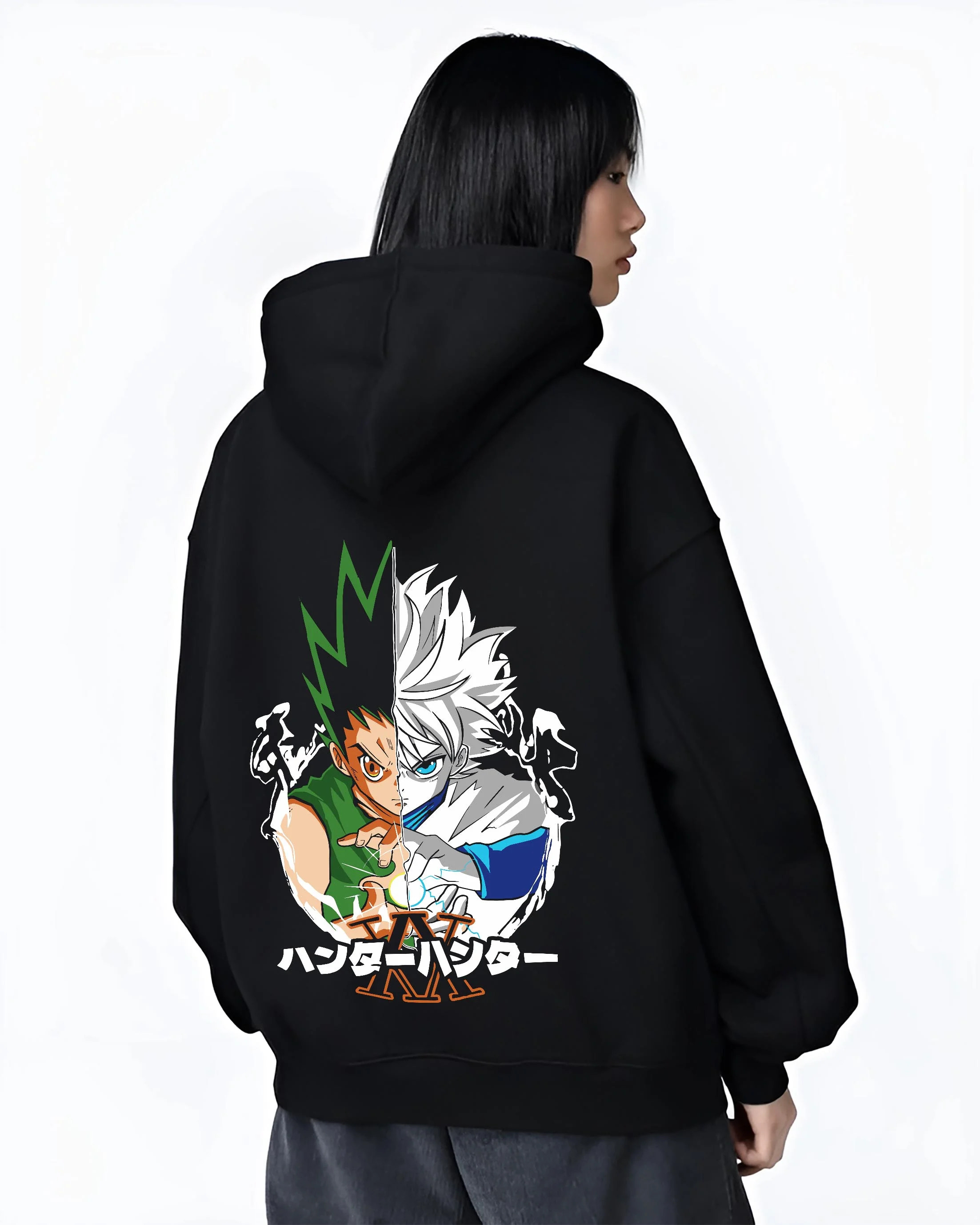 Black hoodie worn by female model, back view with Hunter x Hunter Hoodie Gon Killua Team Jumper graphic streetwear graphic.