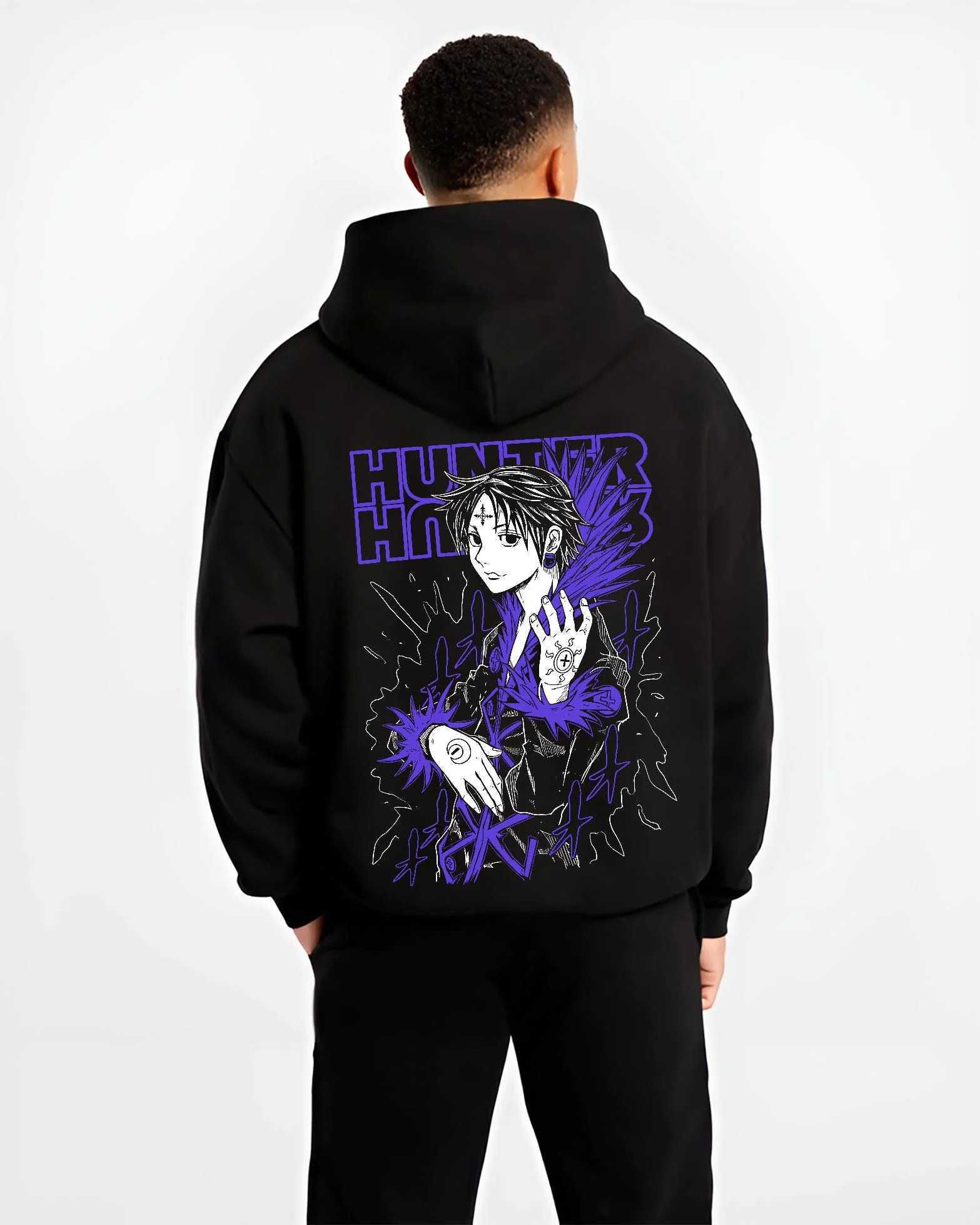 Black hoodie worn by male model, back view with Hunter x Hunter Hoodie Chrollo Hisoka Encounter Jumper graphic bold anime graphic.