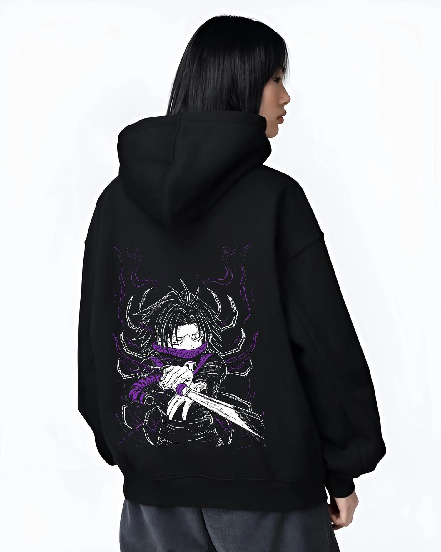 Black hoodie worn by female model, back view with Hunter x Hunter Hoodie Kurapika Scarlet Eyes Jumper graphic bold anime graphic.