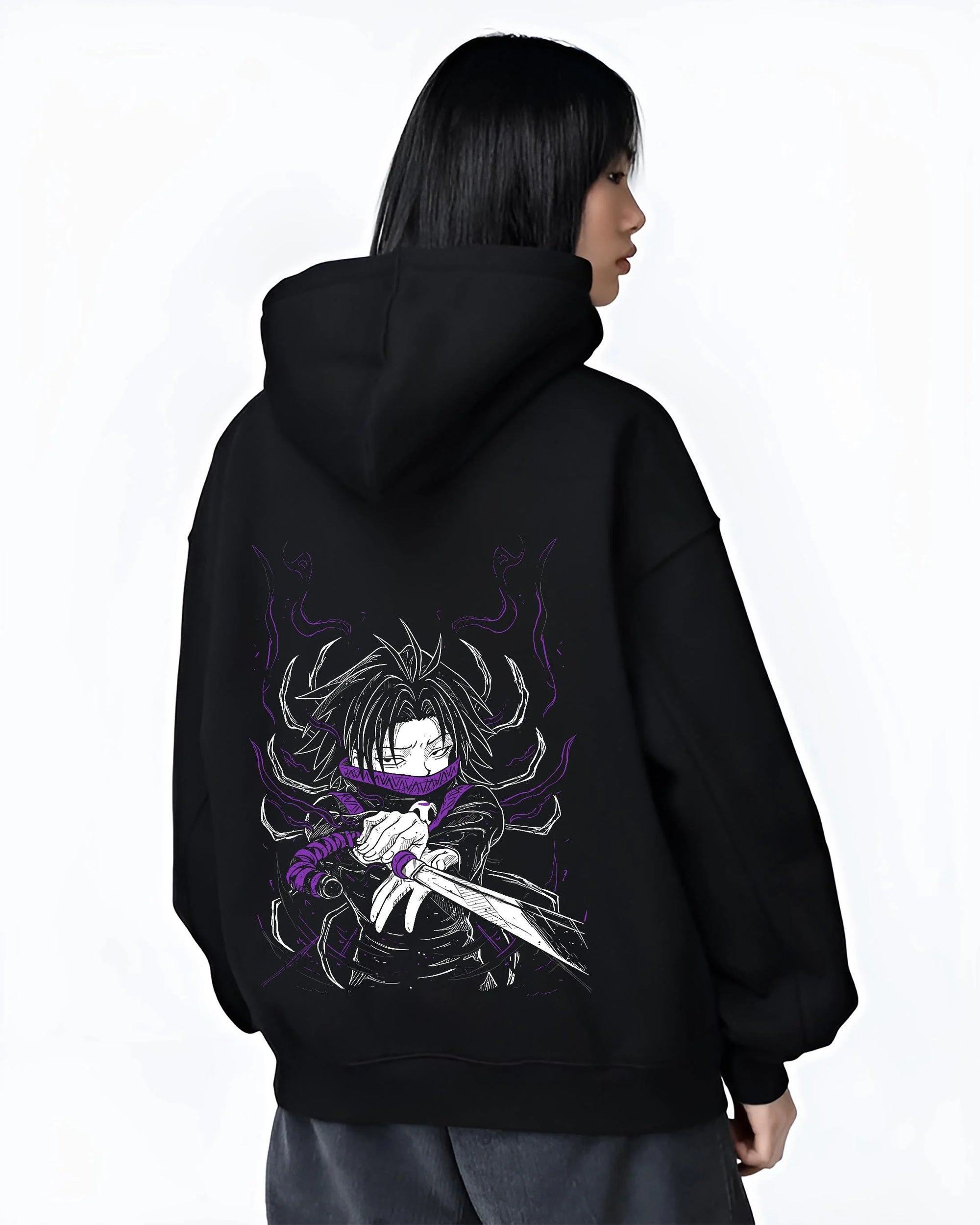 Black hoodie worn by female model, back view with Hunter x Hunter Hoodie Kurapika Scarlet Eyes Jumper graphic bold anime graphic.