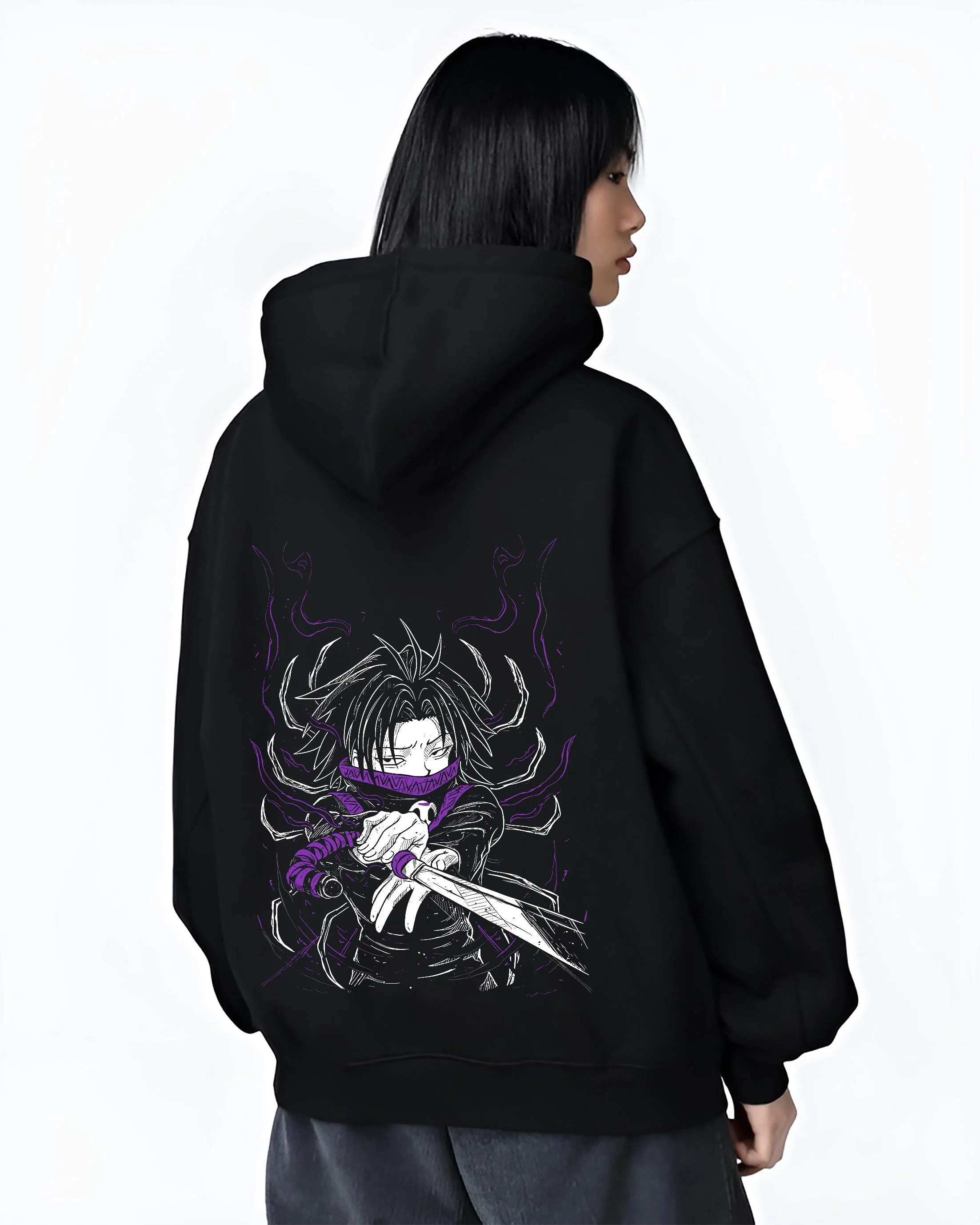 Black hoodie worn by female model, back view with Hunter x Hunter Hoodie Kurapika Scarlet Eyes Jumper graphic bold anime graphic.