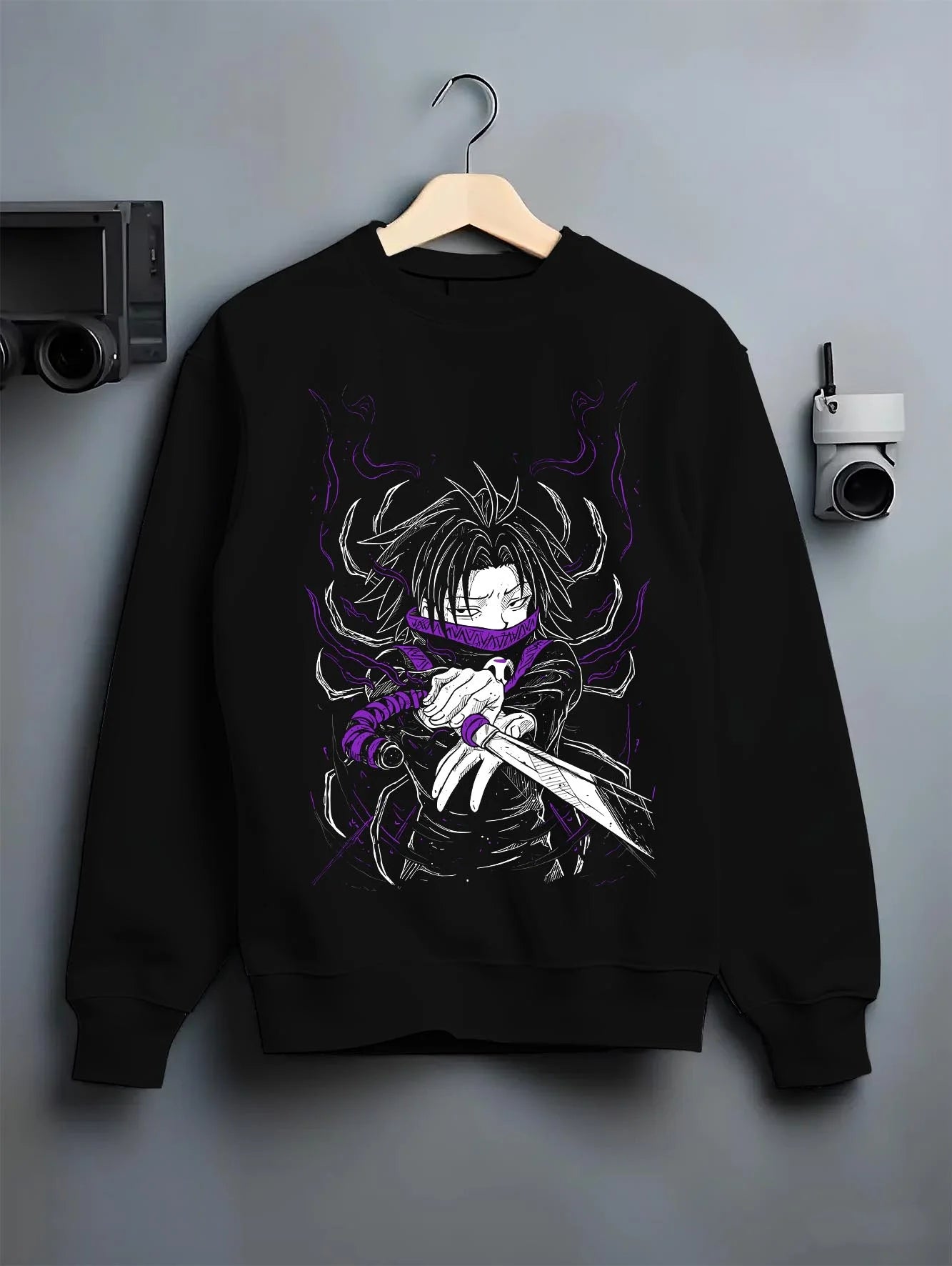 Black crewneck sweatshirt on hanger with Hunter x Hunter Hoodie Kurapika Scarlet Eyes Jumper graphic premium wear.
