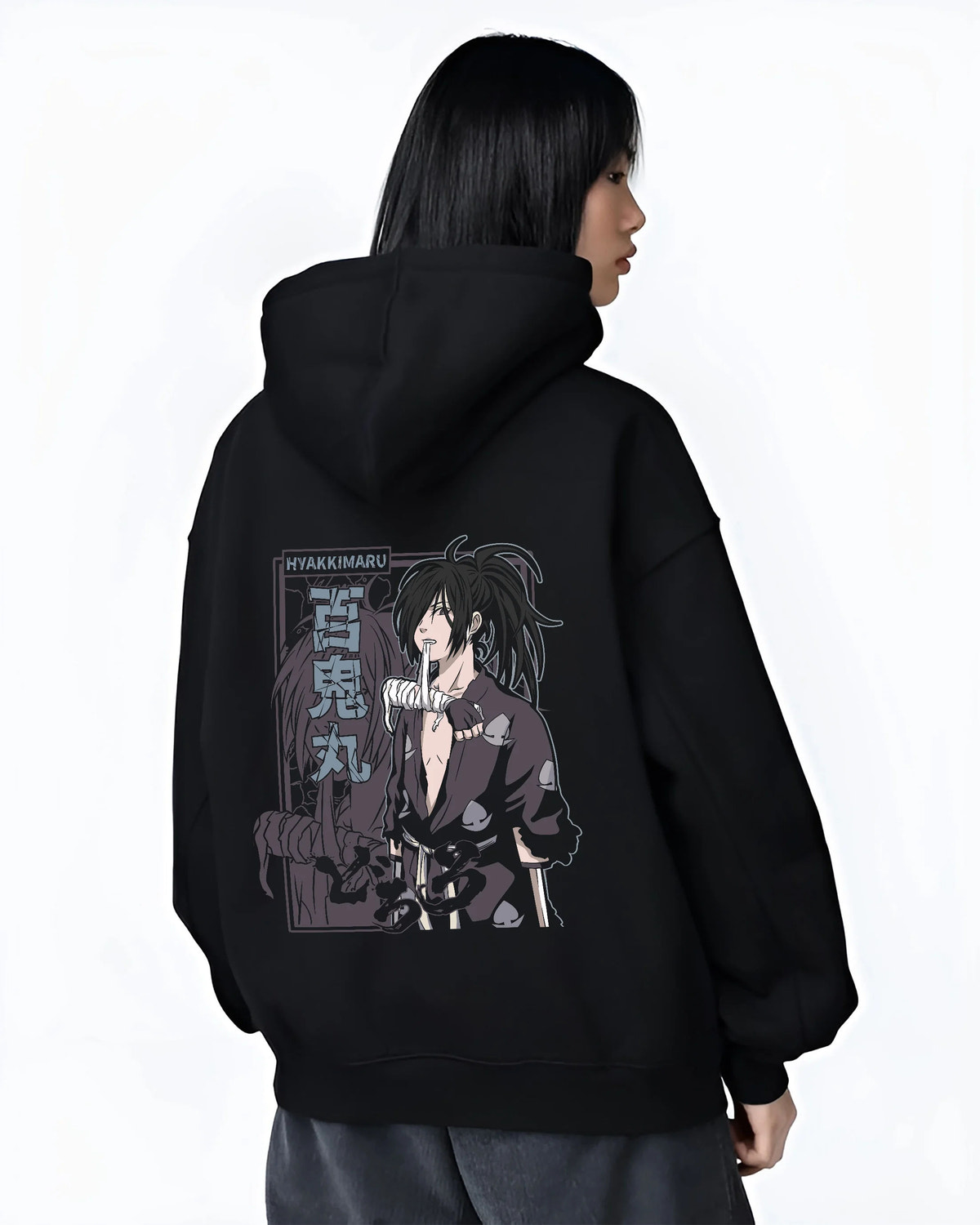 Black hoodie female model back view showing Hyakkimaru from Dororo: Dororo monochrome portrait