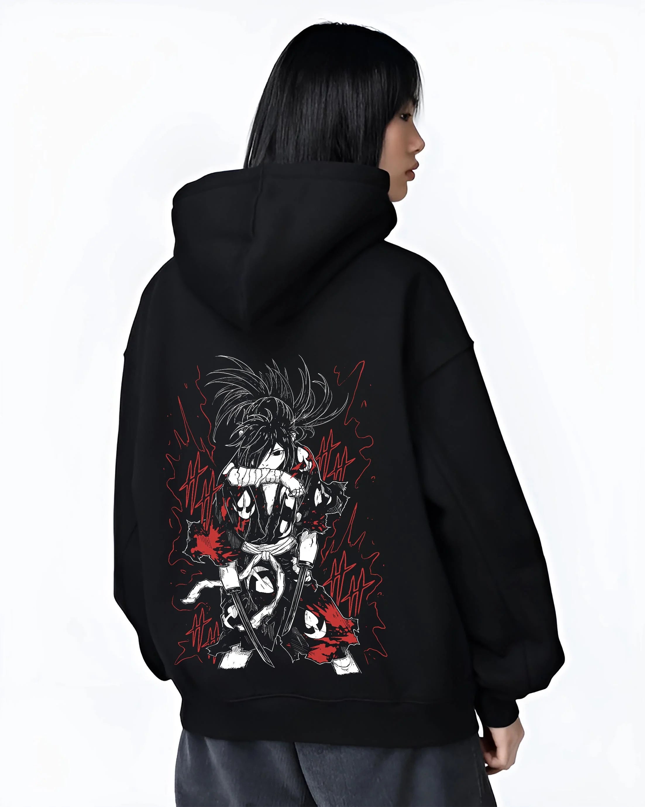 Black hoodie worn by female model, back view with Dororo Hoodie Hyakkimaru Sword Fighter Jumper graphic bold anime graphic.