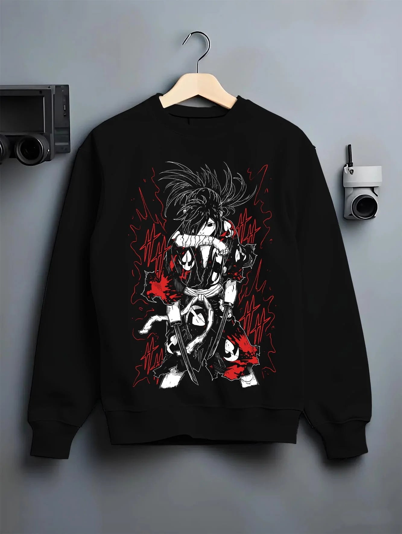 Black crewneck sweatshirt on hanger with Dororo Hoodie Hyakkimaru Sword Fighter Jumper graphic premium wear.