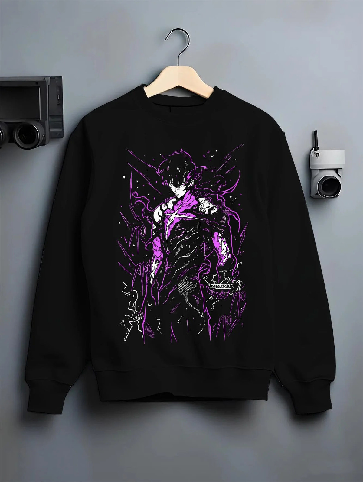 Black crewneck sweatshirt on hanger featuring Gojo purple cursed energy silhouette artwork.