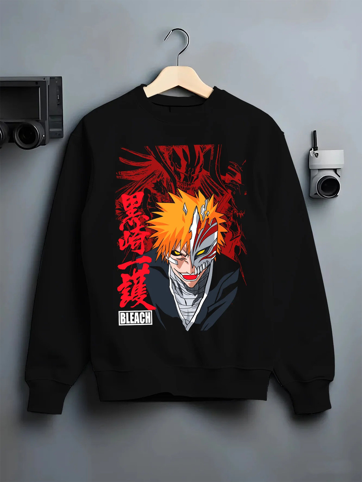 Black crewneck sweatshirt on hanger showing Ichigo Kurosaki from Bleach: half Hollow mask