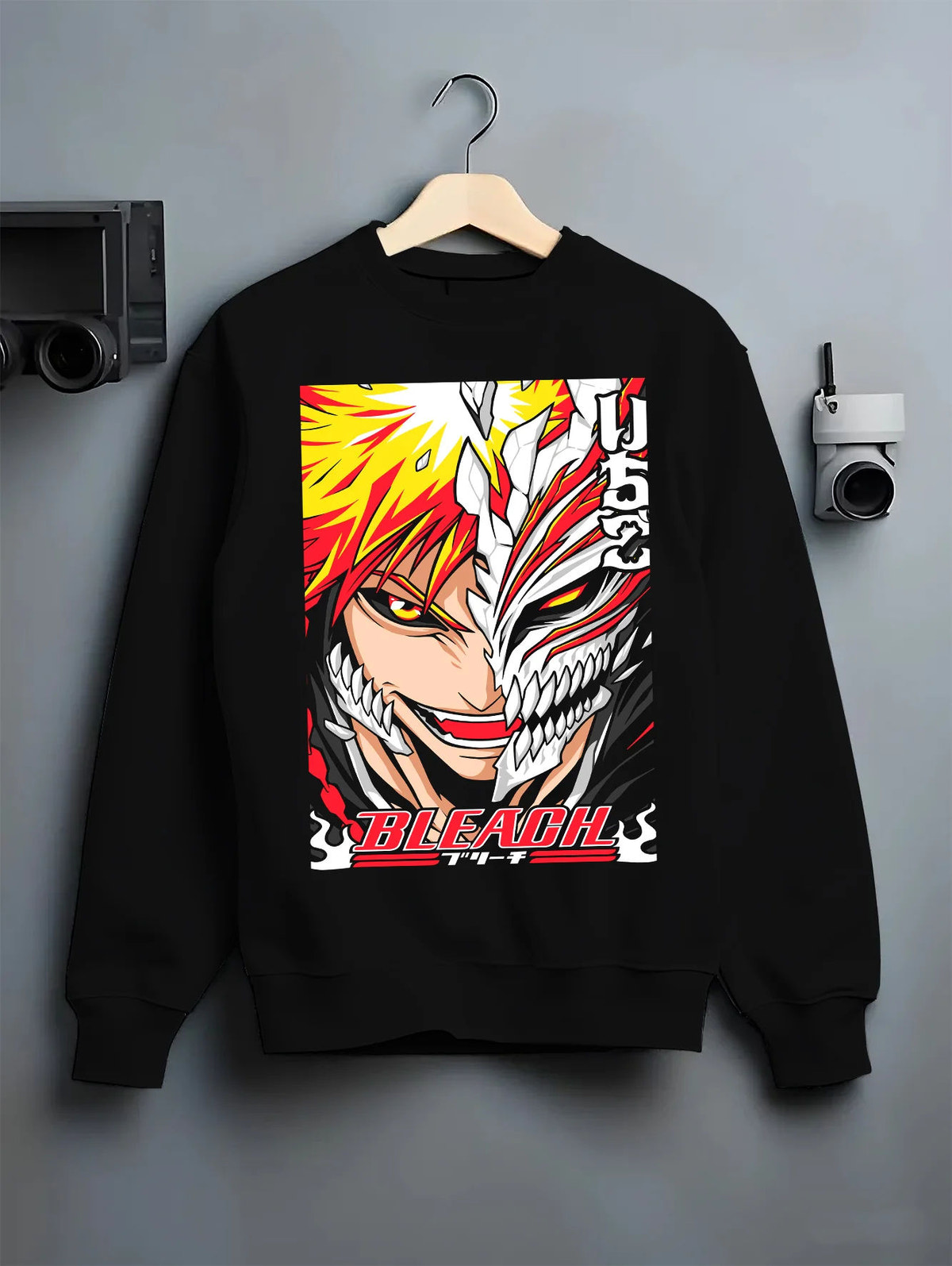 Black crewneck sweatshirt on hanger showing Ichigo Kurosaki from Bleach: half Hollow transformation