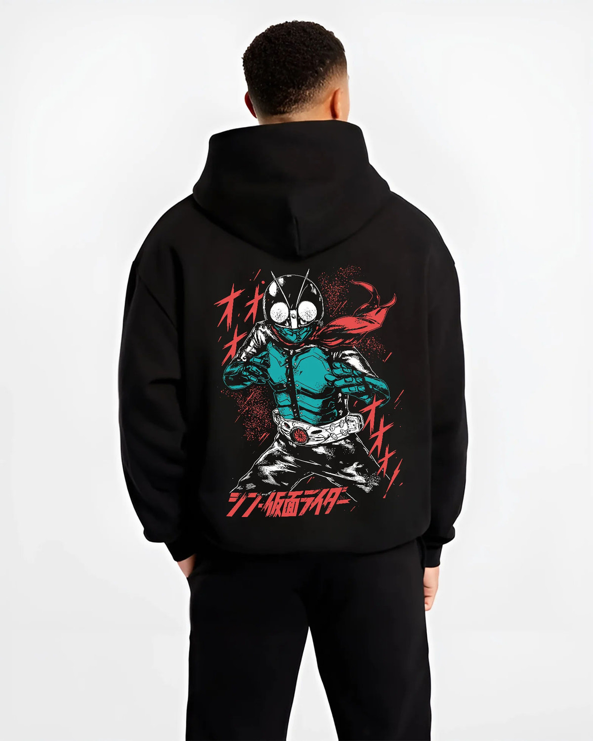 Black hoodie model back view showing Kamen Rider Ichigo: green suit and red scarf