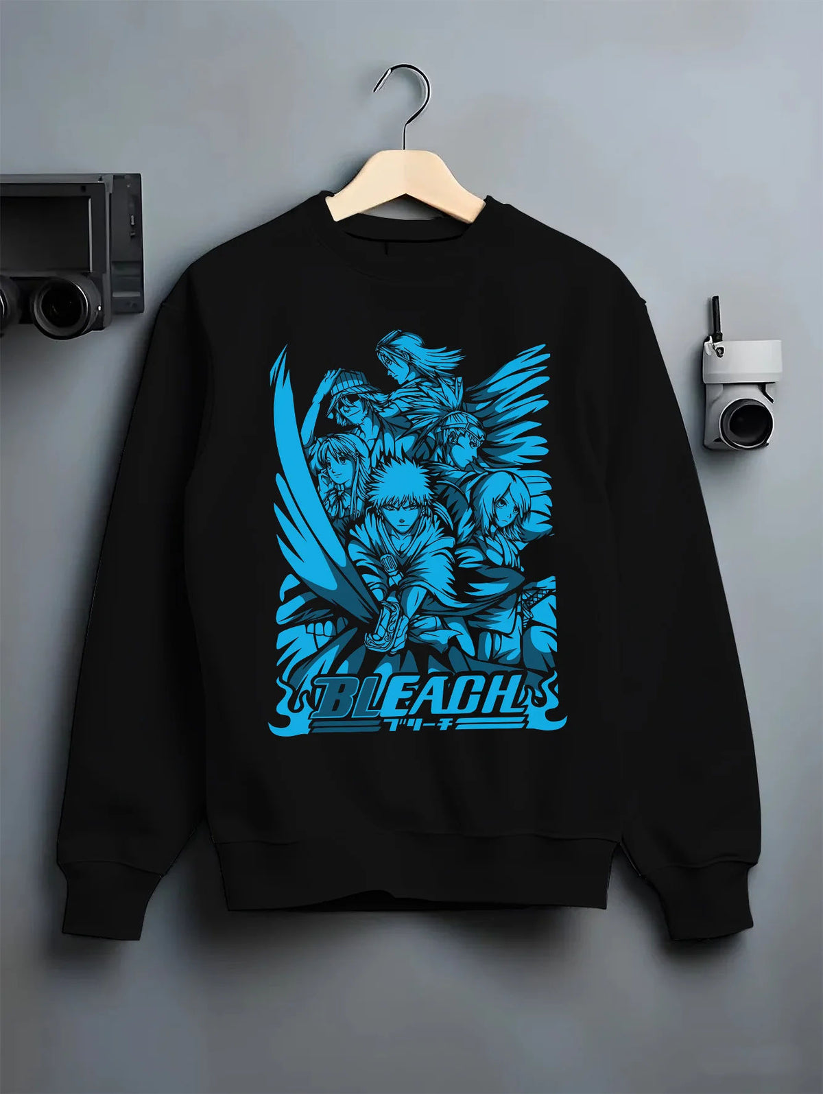 Black crewneck sweatshirt on hanger with Ichigo/Rukia-themed Bleach manga collage illustrated back graphic