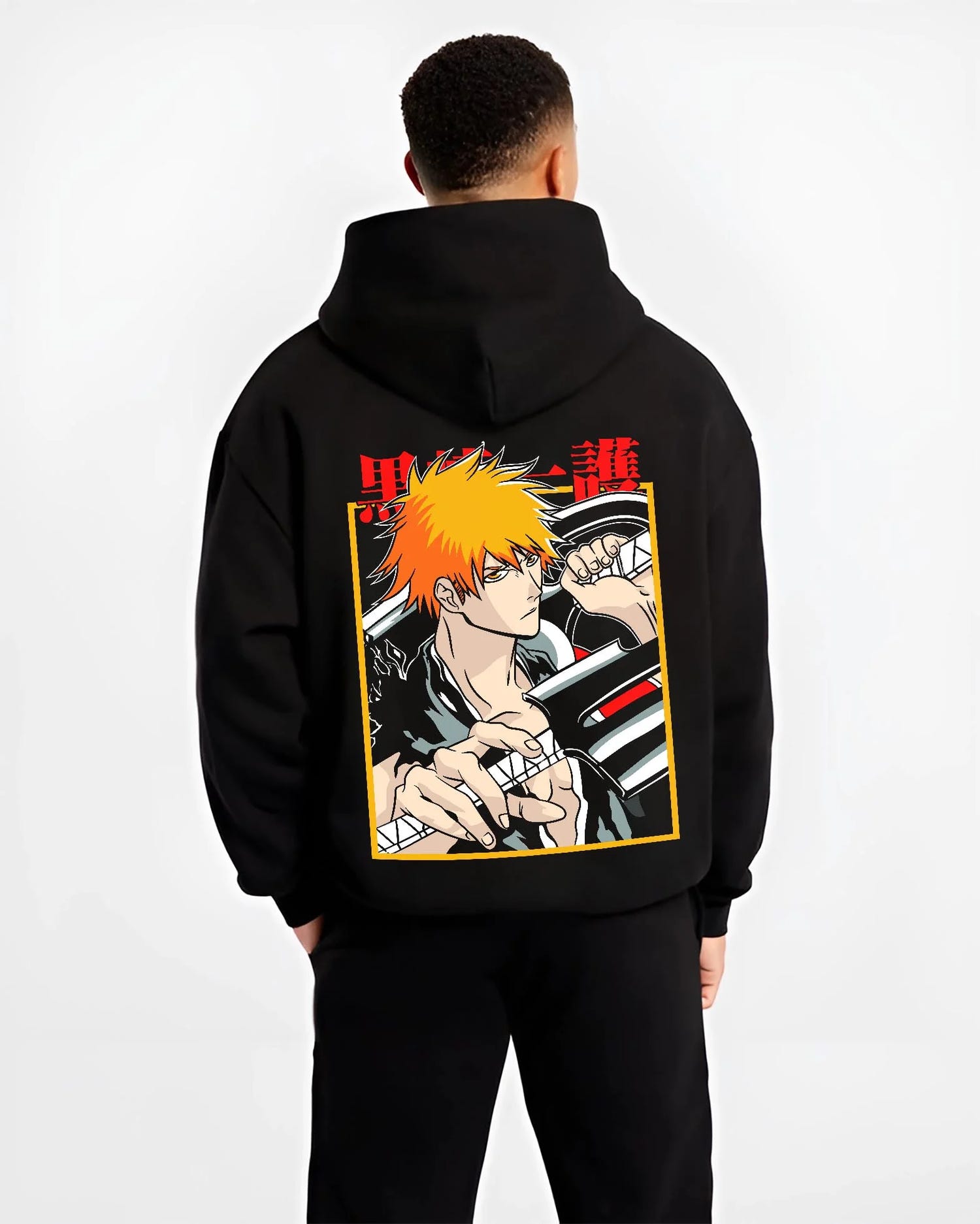 Black hoodie worn by male model, back view with Bleach Hoodie Ichigo Kurosaki Soul Reaper Jumper graphic premium wear.