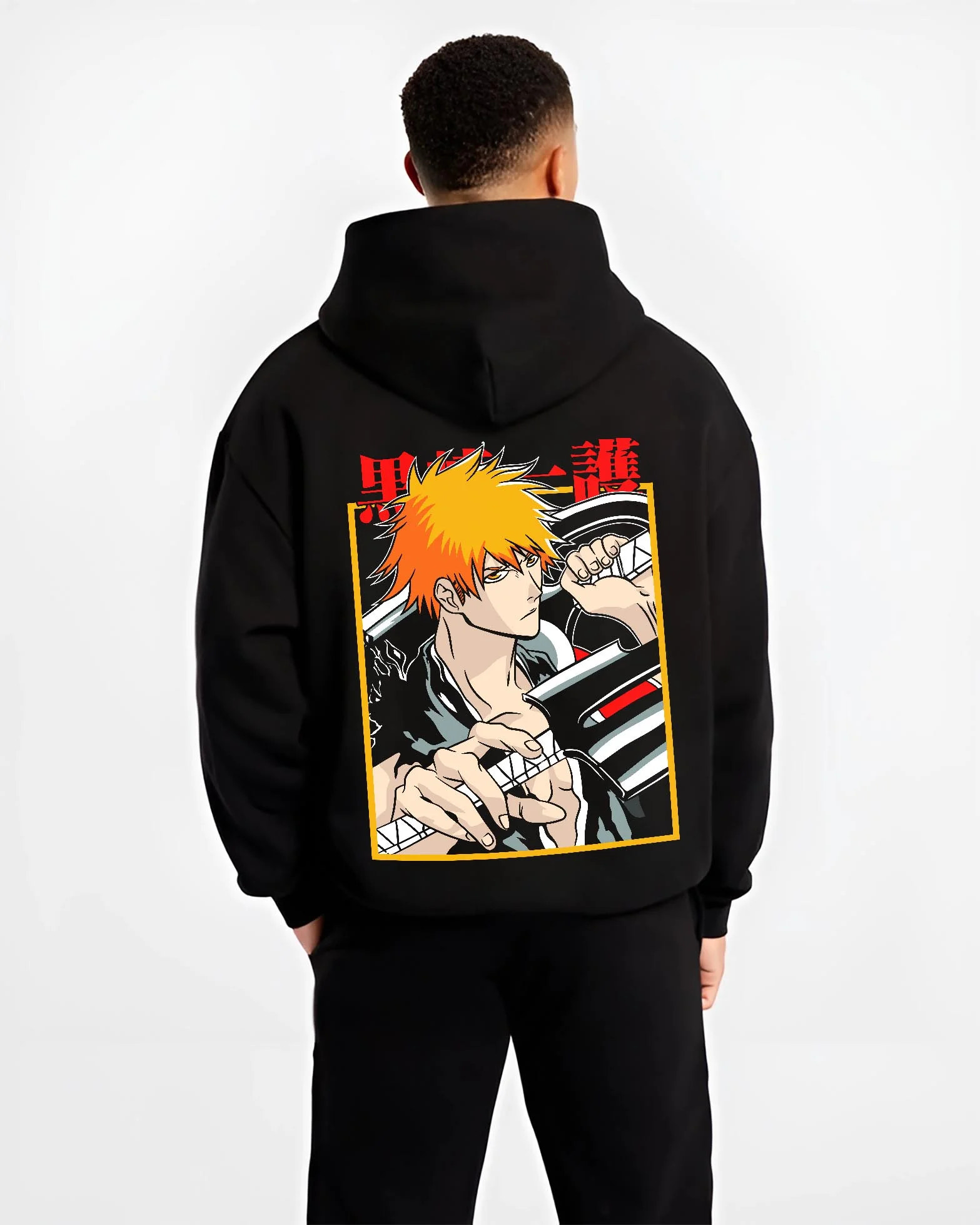 Black hoodie worn by male model, back view with Bleach Hoodie Ichigo Kurosaki Soul Reaper Jumper graphic premium wear.