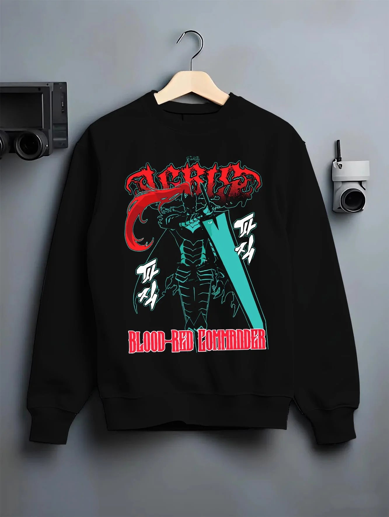 Black crewneck sweatshirt on hanger with Solo Leveling Hoodie Igris Blood Red Jumper graphic premium wear.