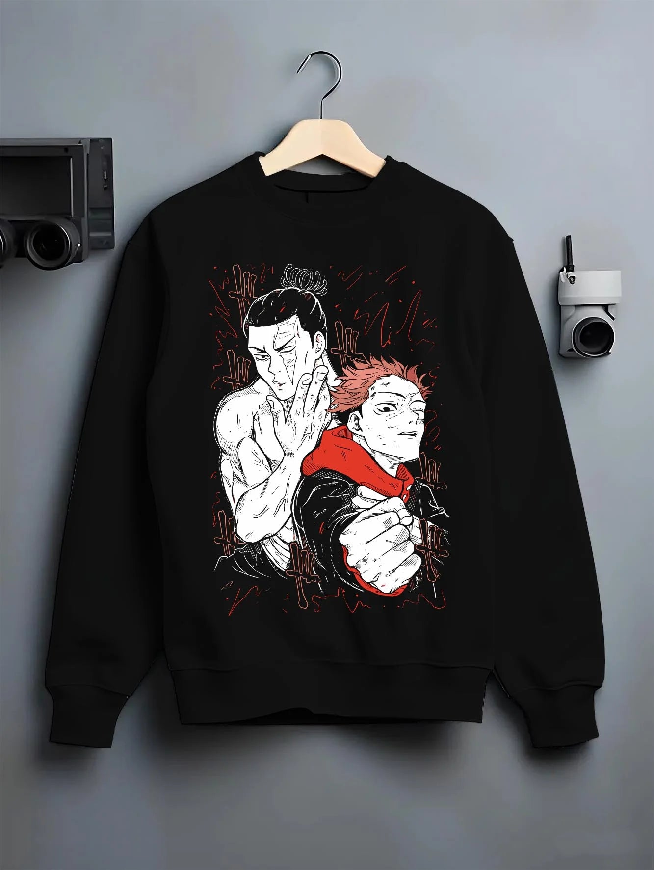 Black crewneck sweatshirt on hanger with Jujutsu Kaisen Hoodie Ijichi Kiyotaka Assistant Jumper graphic streetwear graphic.