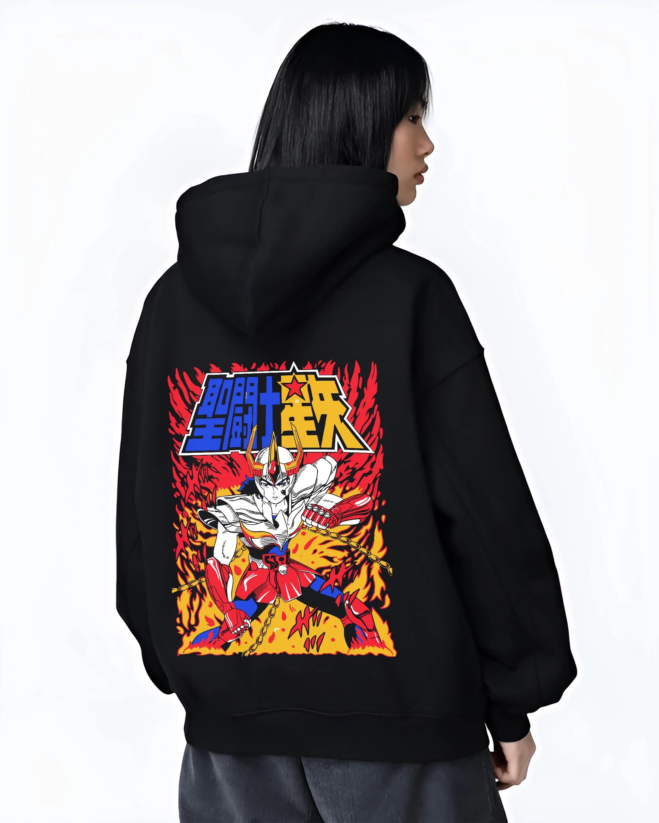 Black hoodie worn by female model, back view with Saint Seiya Hoodie Ikki Phoenix Legendary Jumper graphic streetwear graphic.