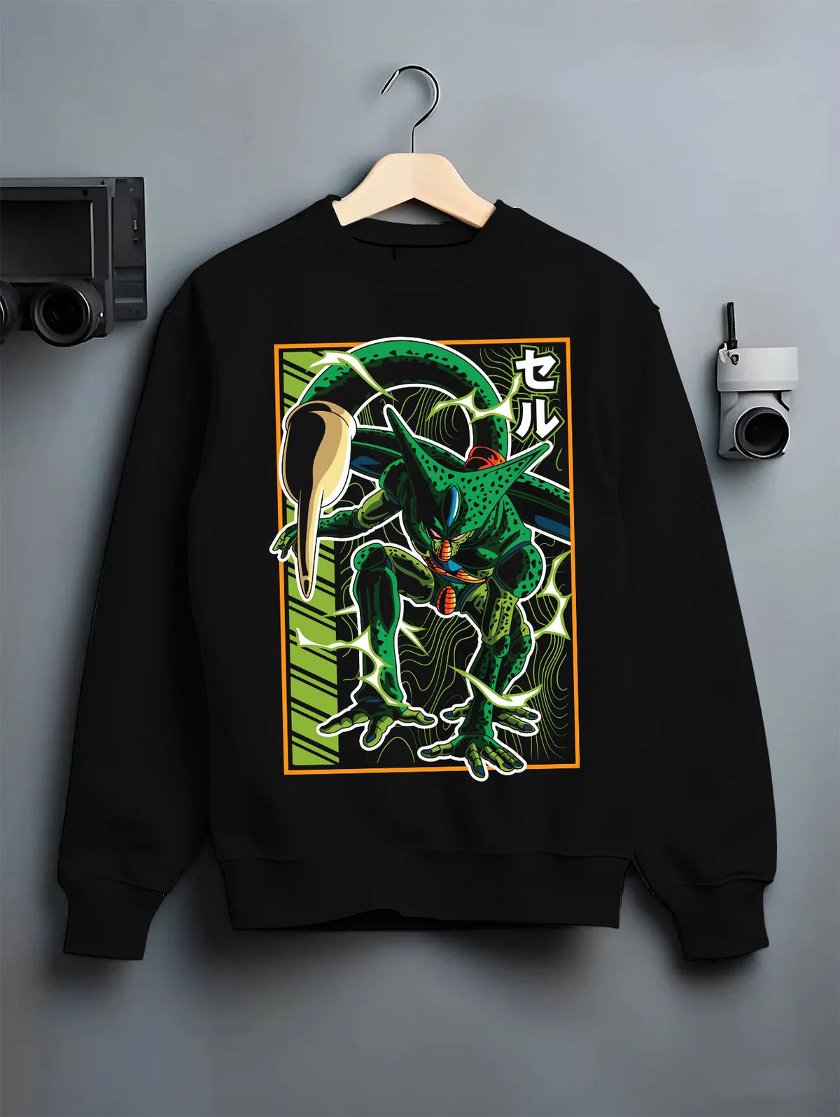Black crewneck sweatshirt on hanger showing Imperfect Cell from Dragon Ball: green insectoid form