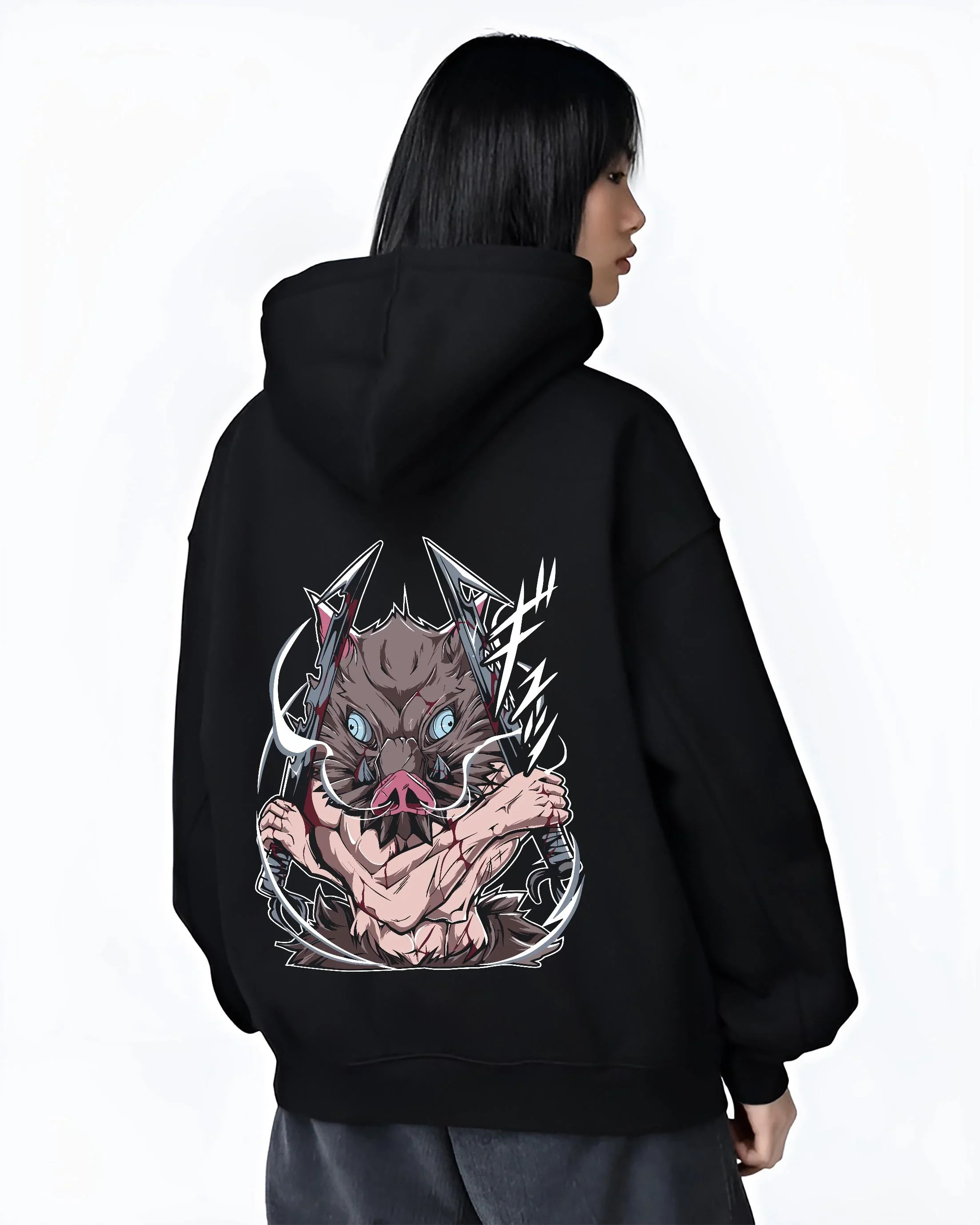 Black hoodie worn by female model, back view with Demon Slayer Hoodie Inosuke Hashibira Beast Jumper graphic premium wear.
