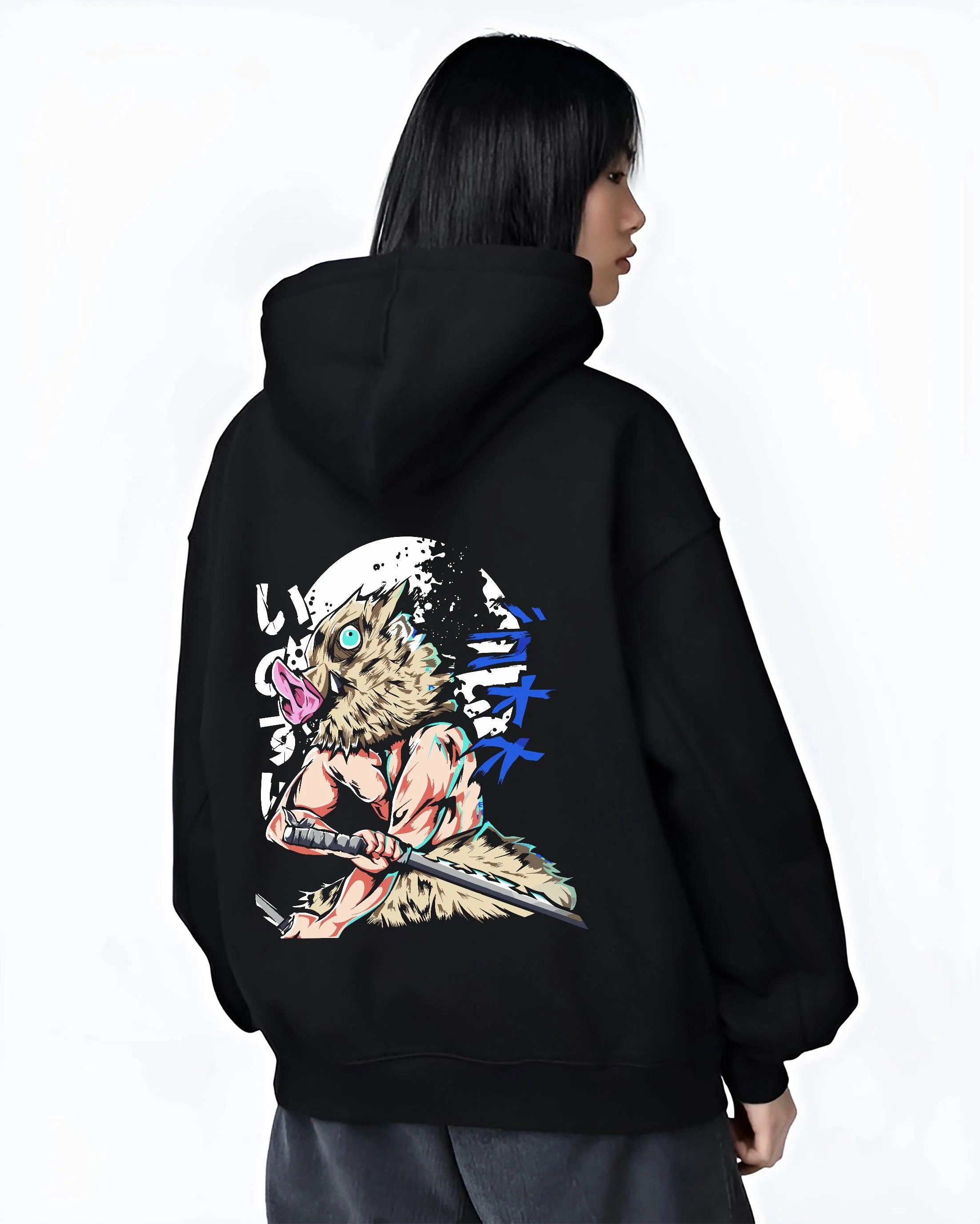 Black hoodie worn by female model, back view with Demon Slayer Hoodie Inosuke Hashibira Twin Blades Jumper graphic premium wear.