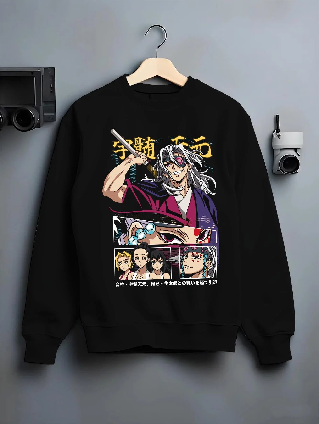 Black crewneck sweatshirt on hanger displaying Tengen Uzui retro panel anime artwork from Demon Slayer with cult classic poster inspired graphic.