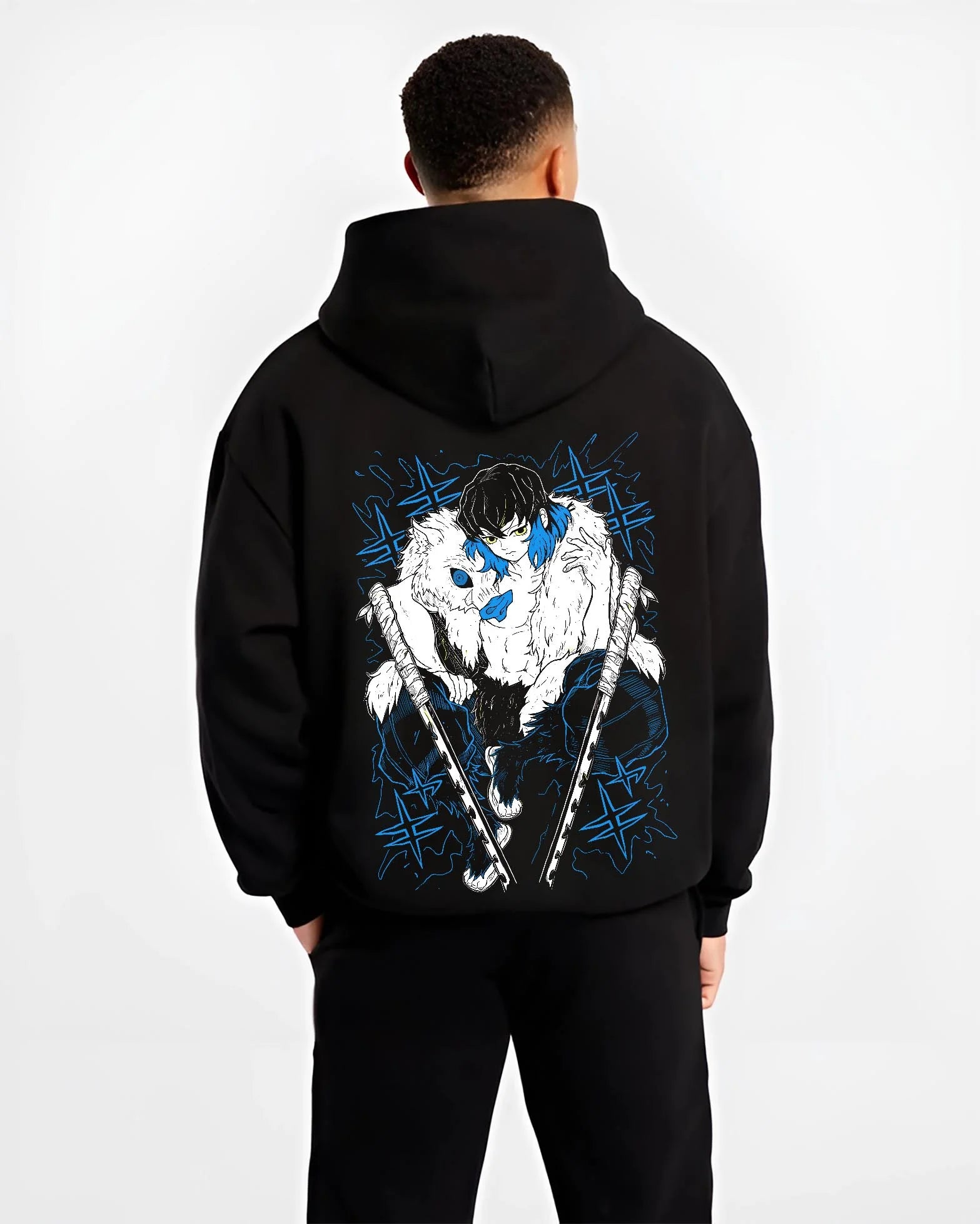 Black hoodie worn by male model, back view with Demon Slayer Hoodie Inosuke Hashibira Dynamic Jumper graphic streetwear graphic.
