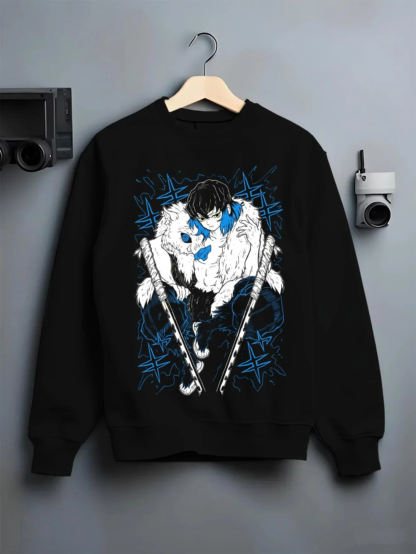 Black crewneck sweatshirt on hanger with Demon Slayer Hoodie Inosuke Hashibira Dynamic Jumper graphic streetwear graphic.