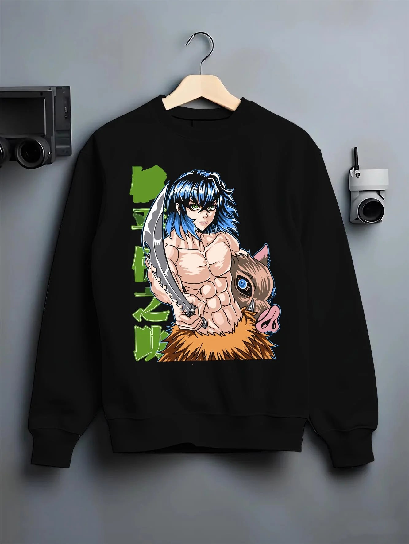 Black crewneck sweatshirt on hanger with Demon Slayer Hoodie Inosuke Hashibira Strong Jumper graphic premium wear.