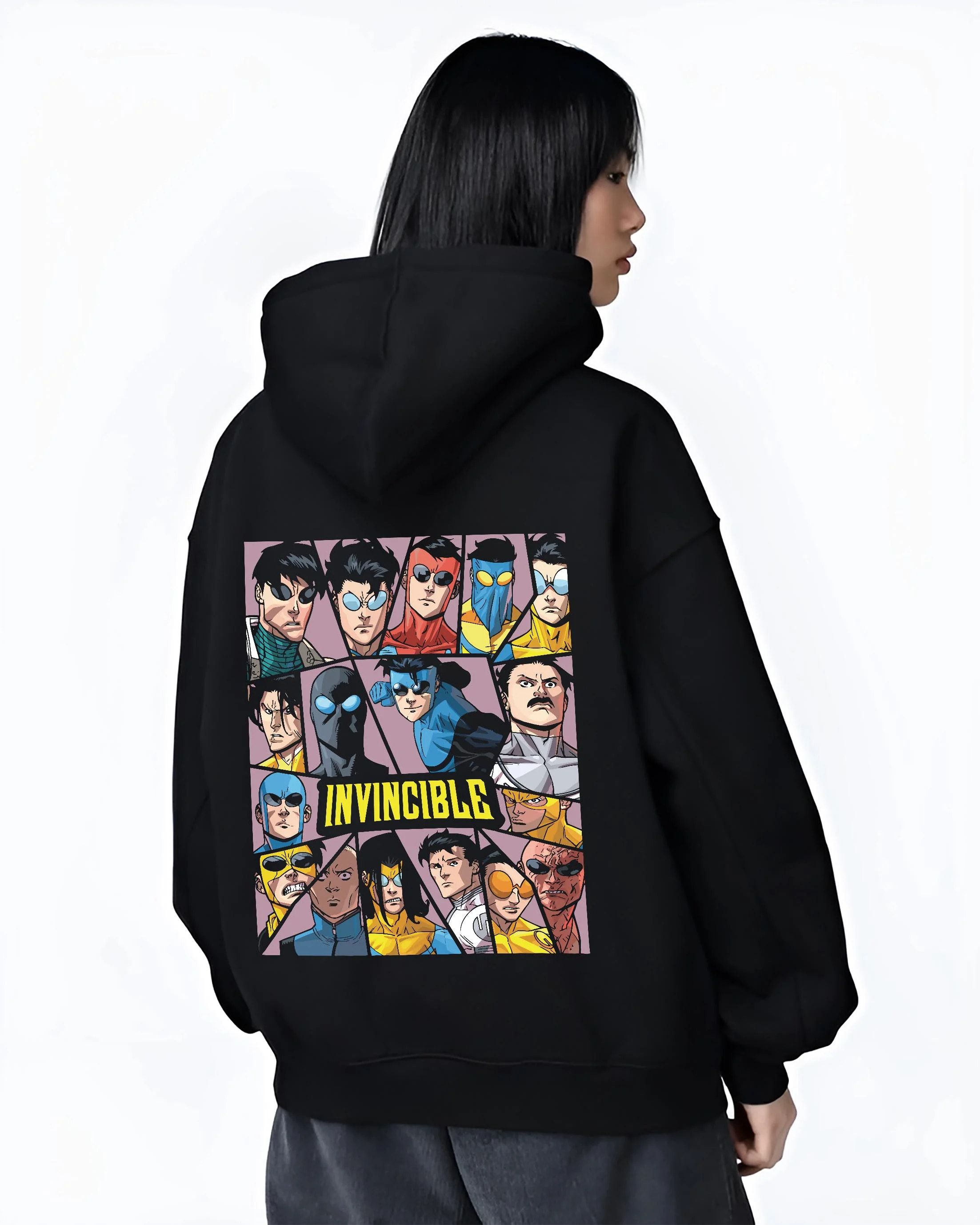 Black hoodie worn by female model, back view with Invincible Hoodie Mark Grayson Team Logo Jumper graphic bold anime graphic.