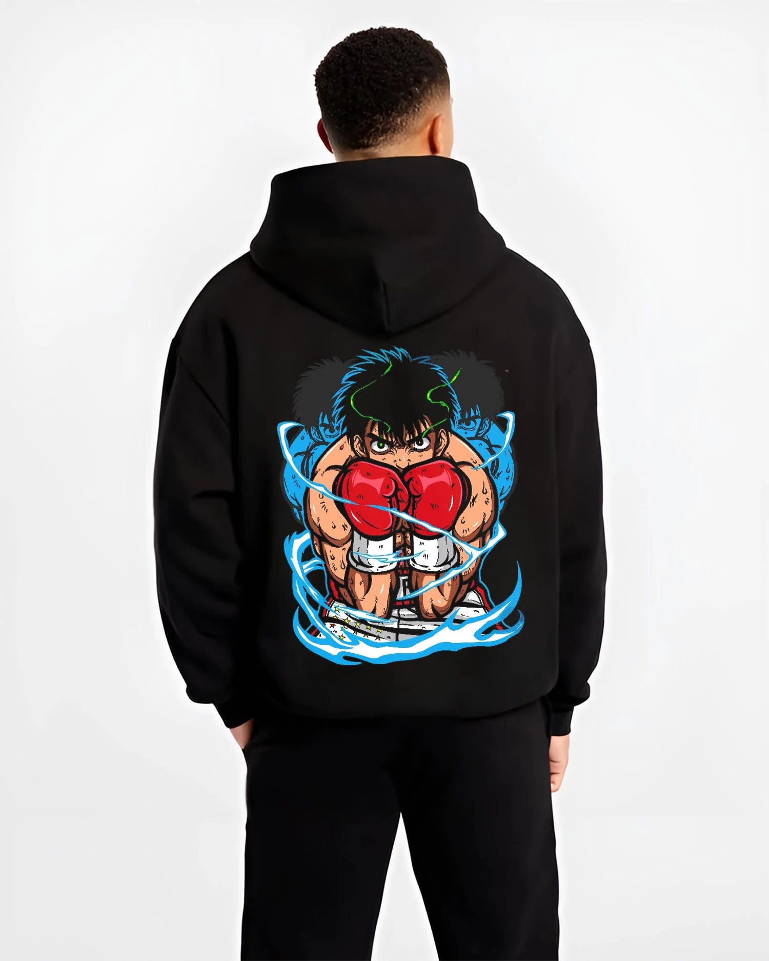 Black hoodie worn by male model, back view with Hajime no Ippo Hoodie Ippo Makunouchi Punch Jumper graphic premium wear.