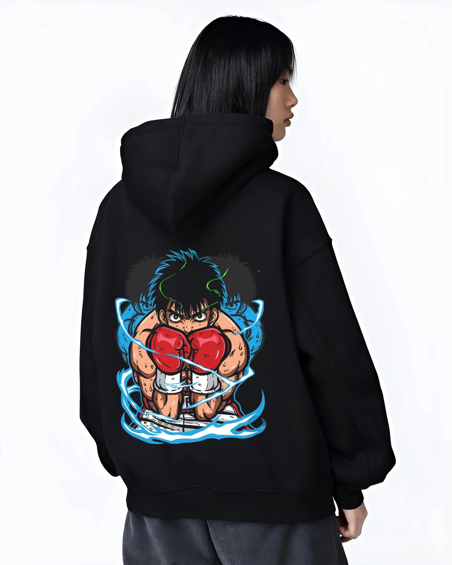 Black hoodie worn by female model, back view with Hajime no Ippo Hoodie Ippo Makunouchi Punch Jumper graphic premium wear.