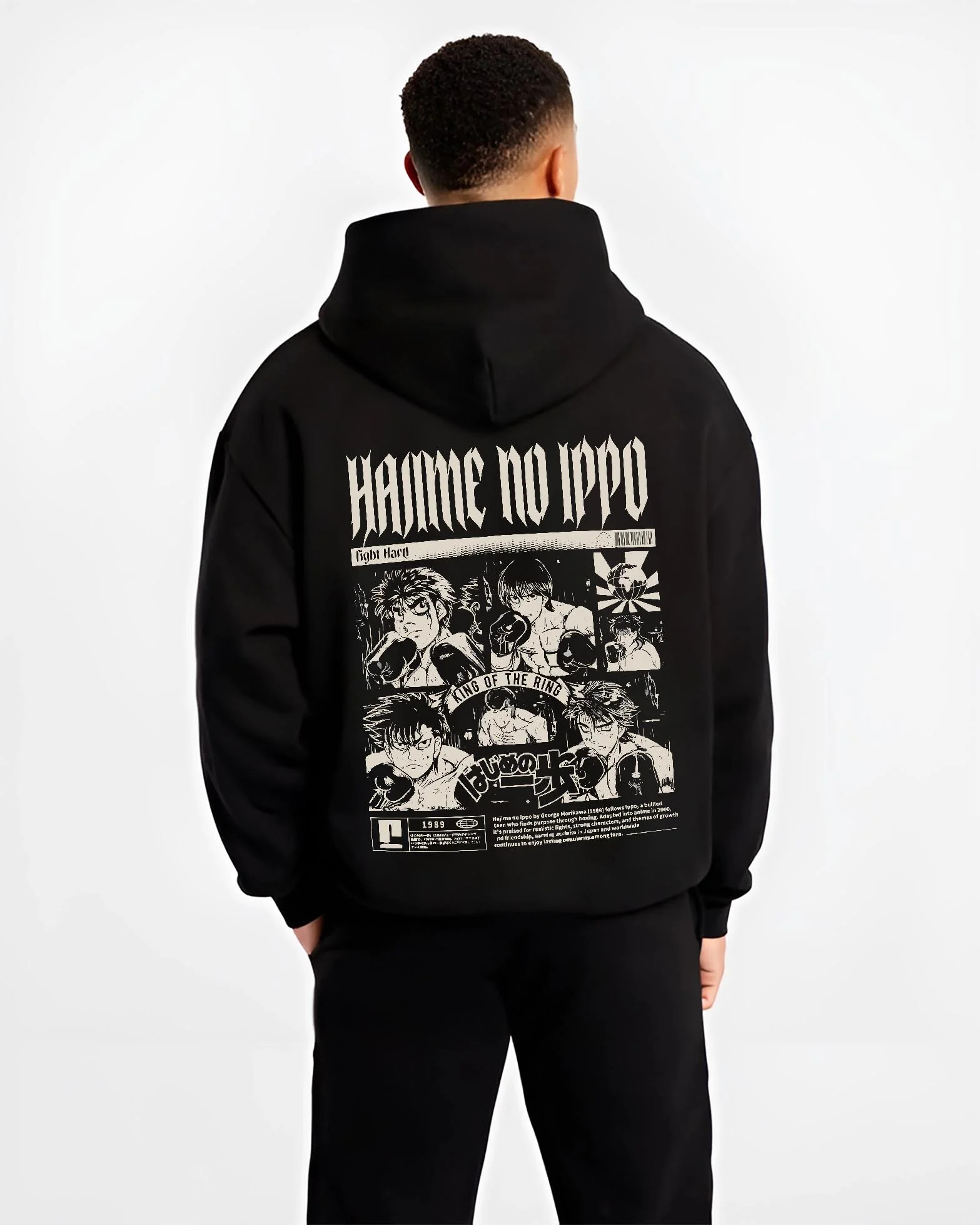 Black hoodie worn by male model, back view with Hajime no Ippo Hoodie Ippo Makunouchi Champion Jumper graphic streetwear graphic.