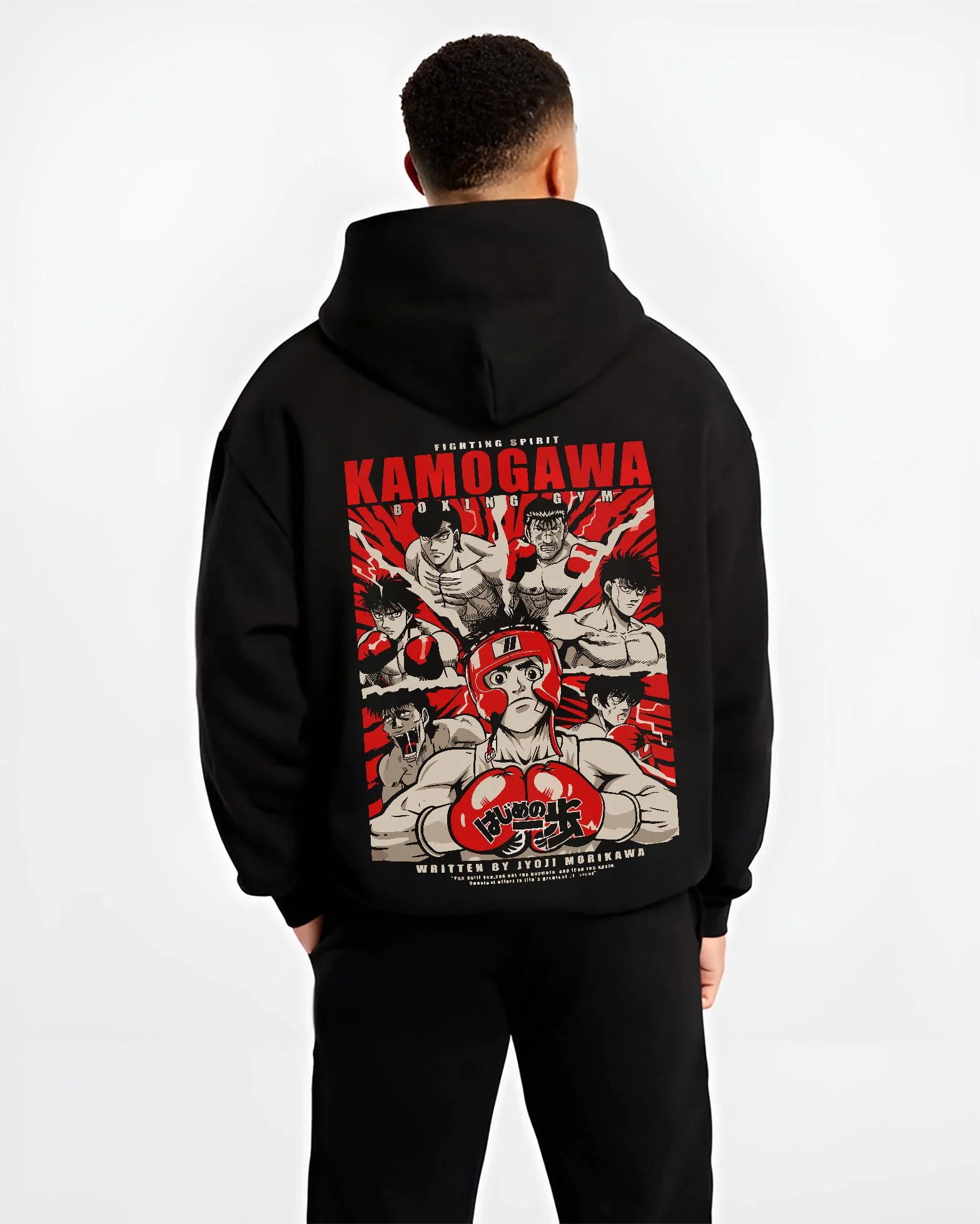 Black hoodie worn by male model, back view with Hajime no Ippo Hoodie Kamogawa Gym Boxing Jumper graphic premium wear.