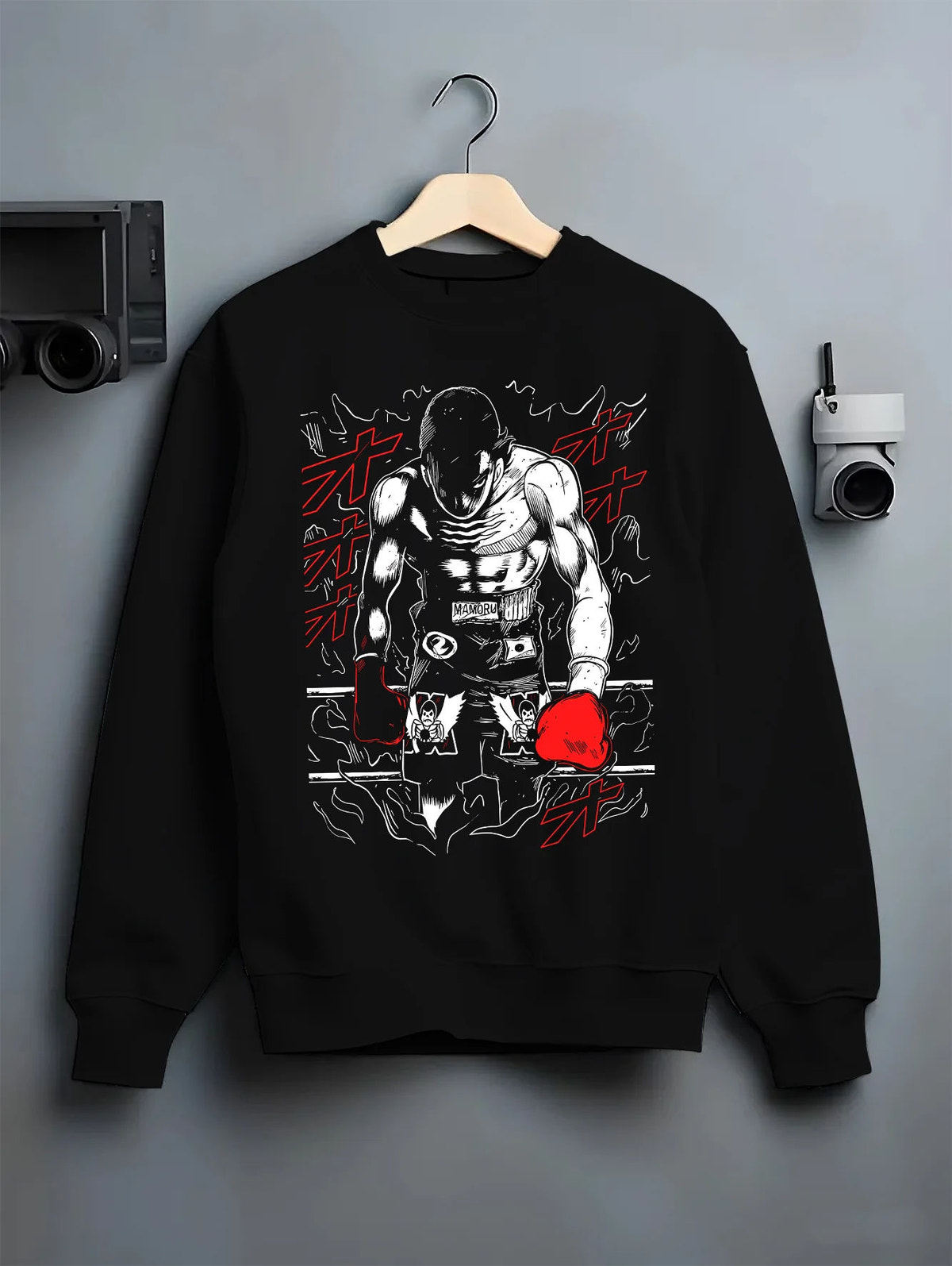Black crewneck sweatshirt on hanger showing Ippo Makunouchi from Hajime no Ippo: boxing training poster