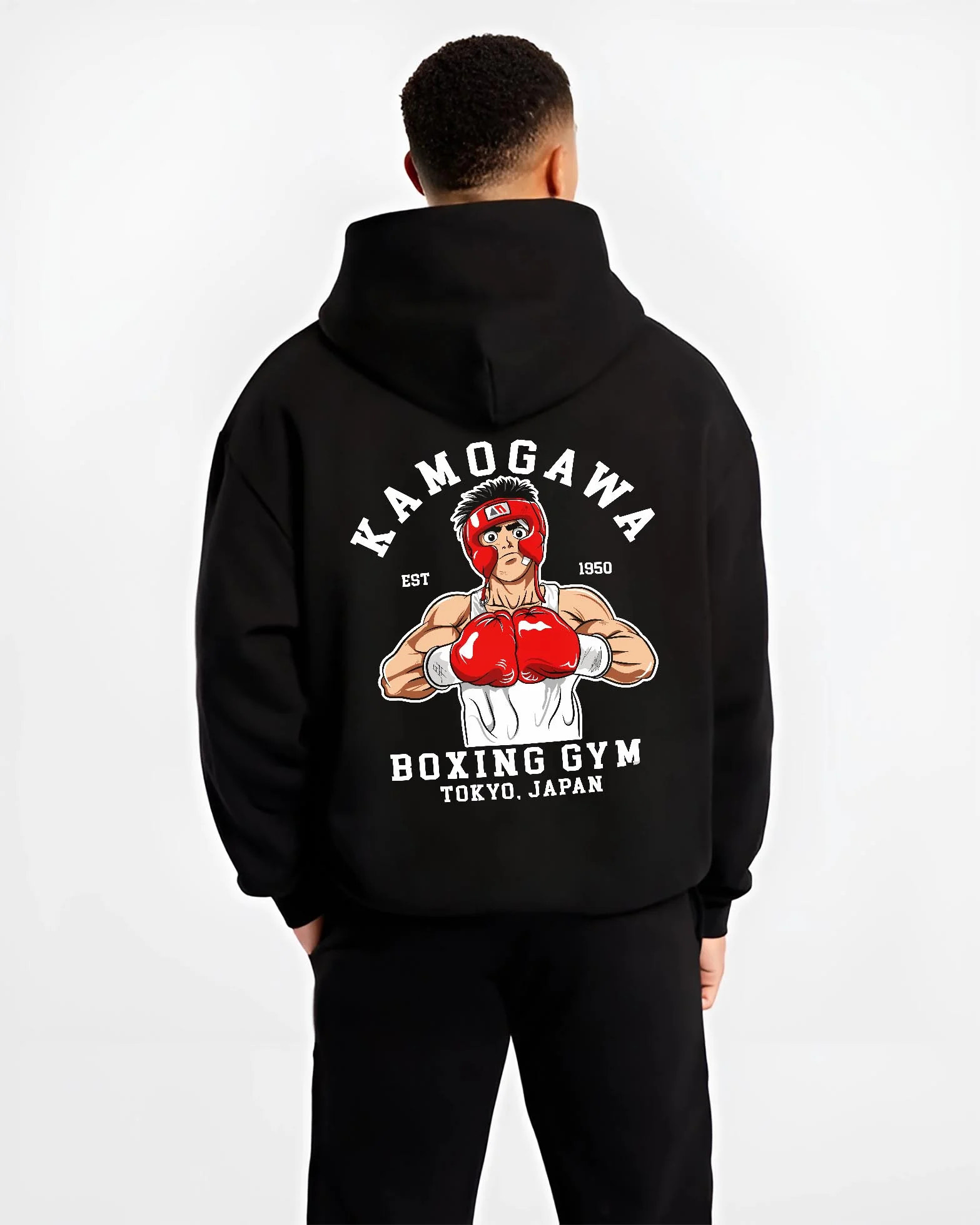 Black hoodie worn by male model, back view with Hajime no Ippo Hoodie Ippo Makunouchi Ring Jumper graphic bold anime graphic.