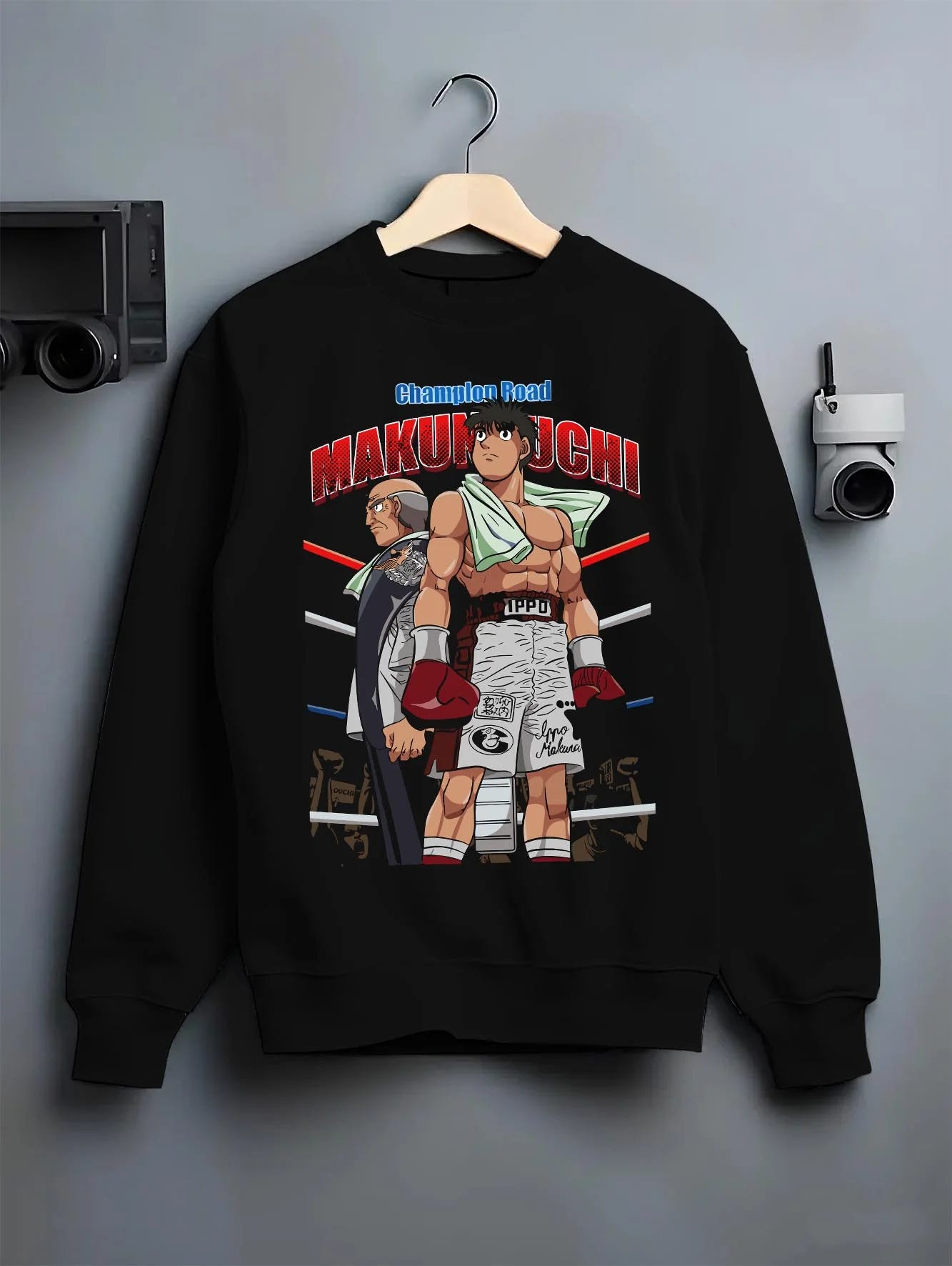 Black crewneck sweatshirt on hanger with Hajime no Ippo Hoodie Ippo Makunouchi Training Jumper graphic premium wear.
