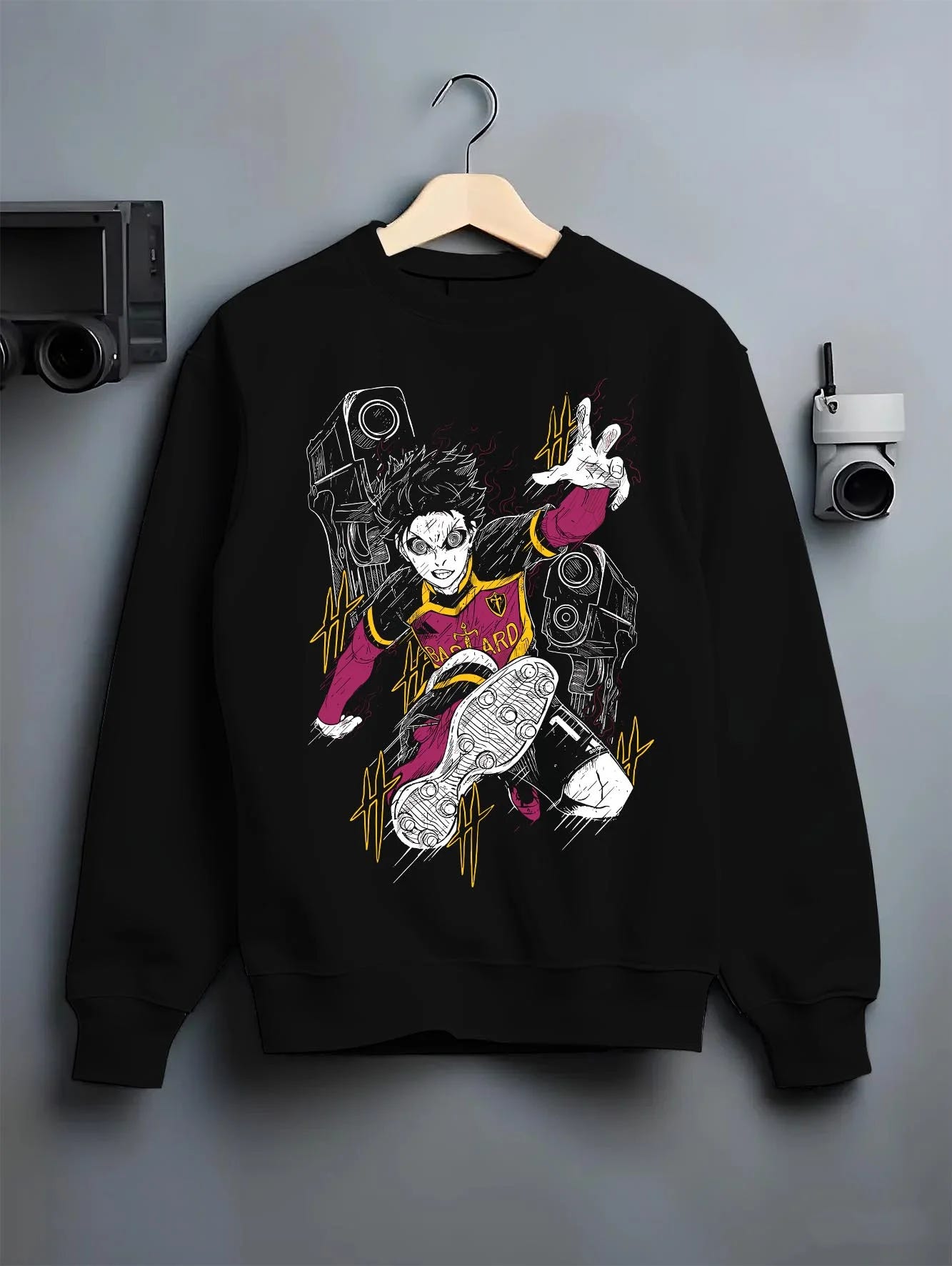 Black crewneck sweatshirt on hanger with Isagi Hoodie Blue Lock Striker Football Forward Play graphic streetwear graphic.