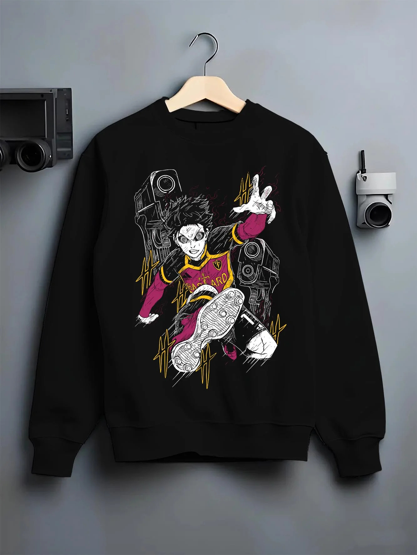 Black crewneck sweatshirt on hanger with Isagi Hoodie Blue Lock Striker Football Forward Play graphic streetwear graphic.