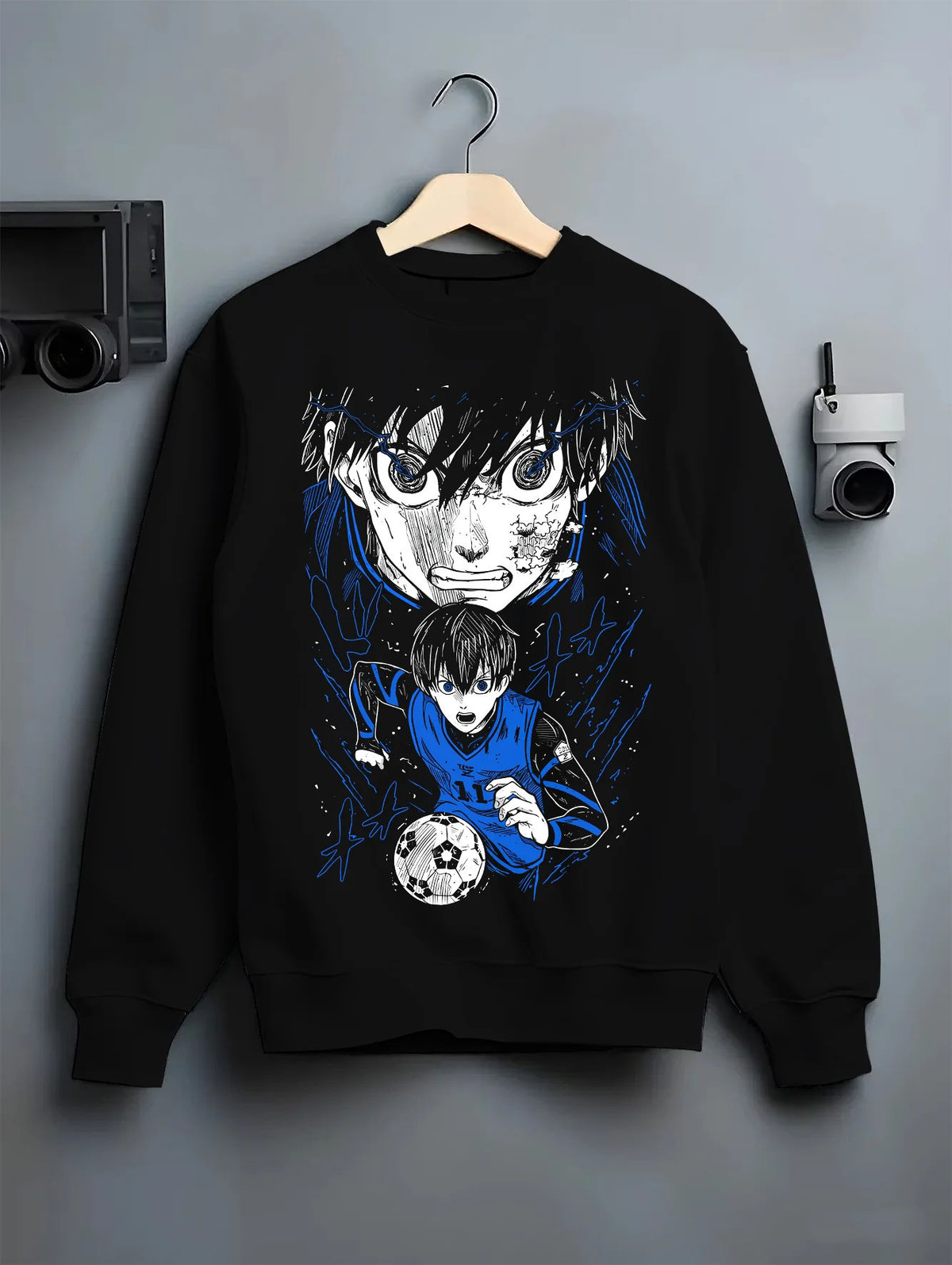 Black crewneck sweatshirt on hanger showing Isagi Yoichi from Blue Lock: Blue Lock footballer close-up