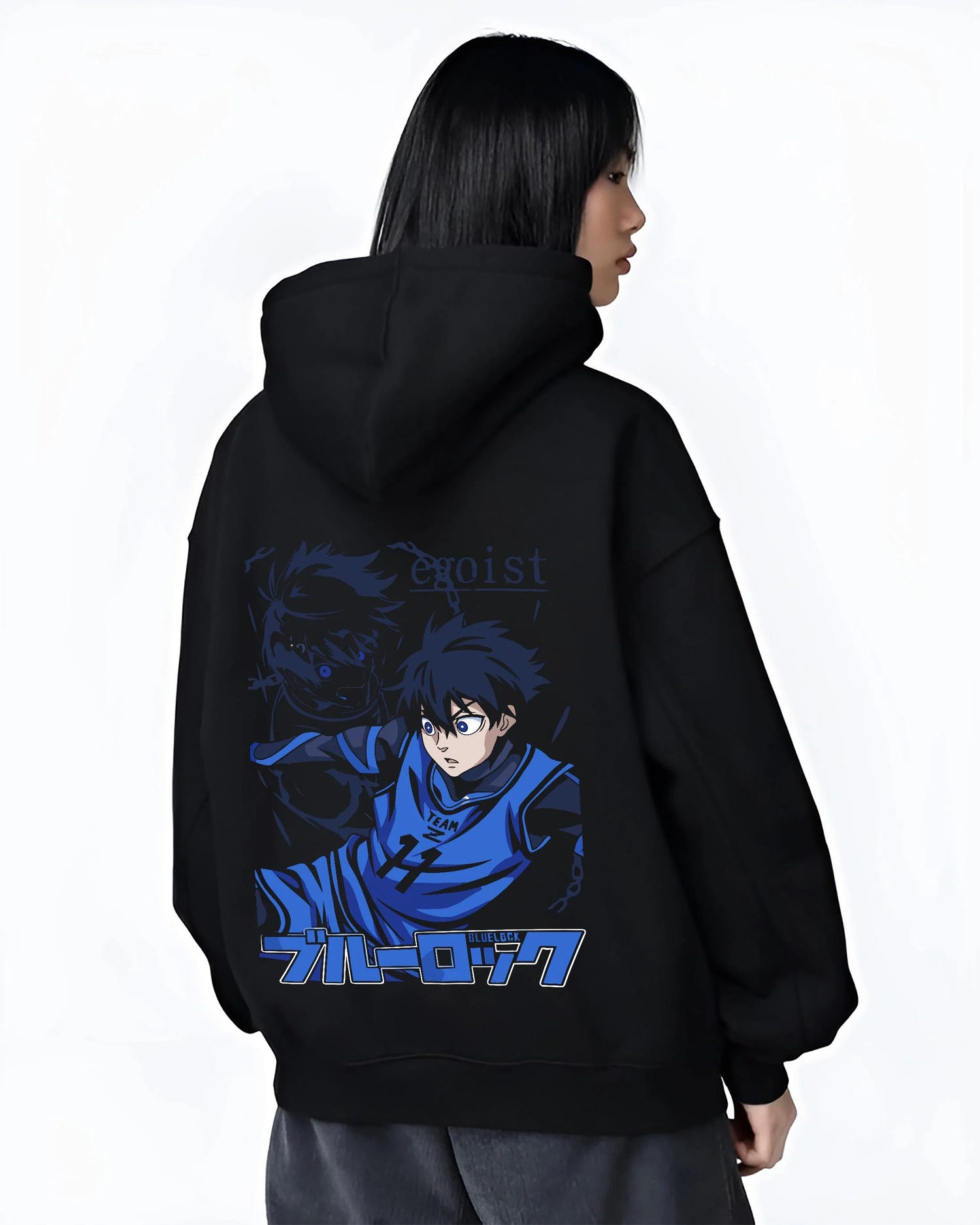 Black hoodie worn by female model, back view with Blue Lock Hoodie Isagi Yoichi Power Shot Jumper graphic streetwear graphic.