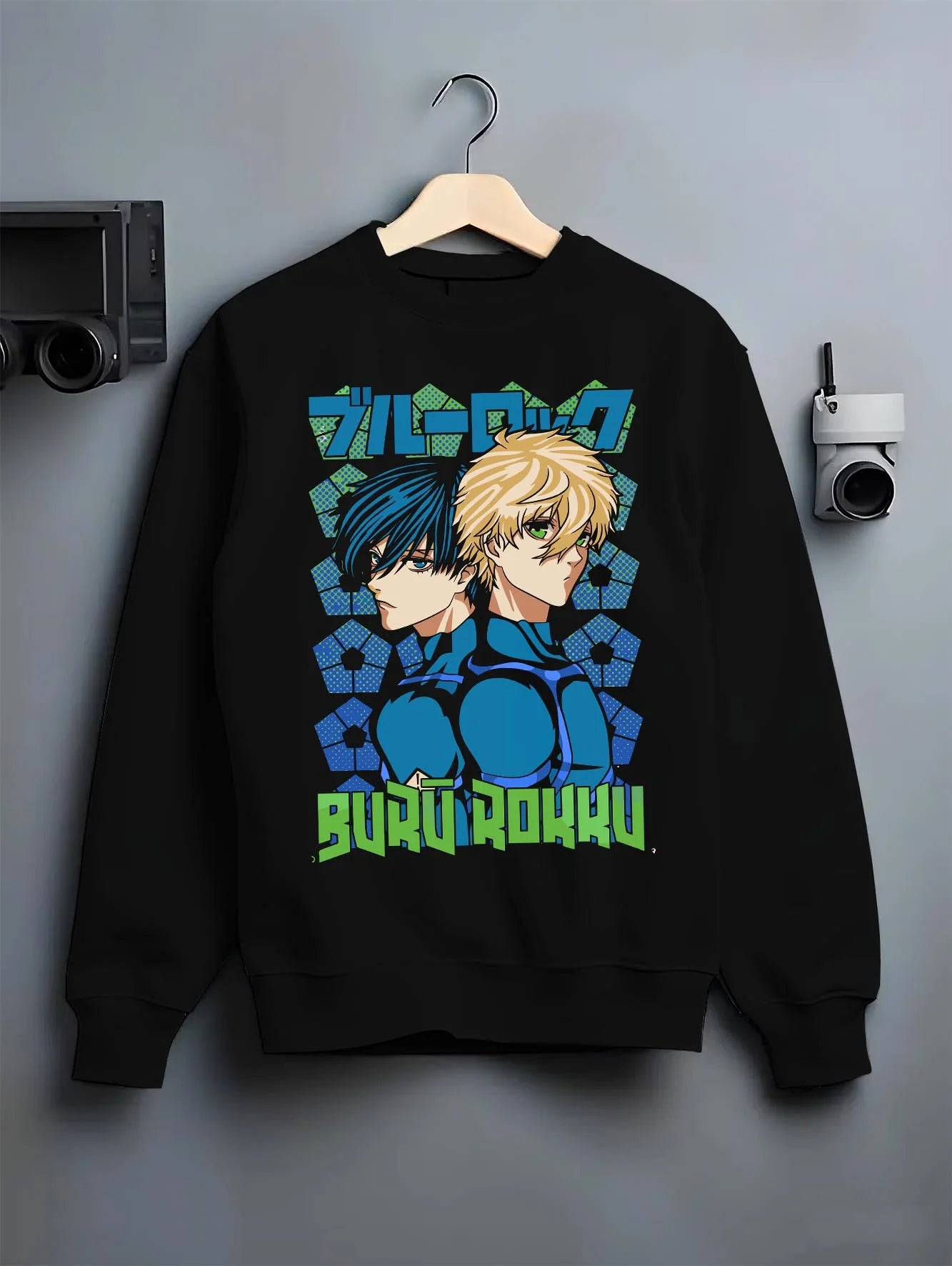 Black crewneck sweatshirt on hanger with Blue Lock Hoodie Isagi Bachira Duo Striker Forward graphic bold anime graphic.