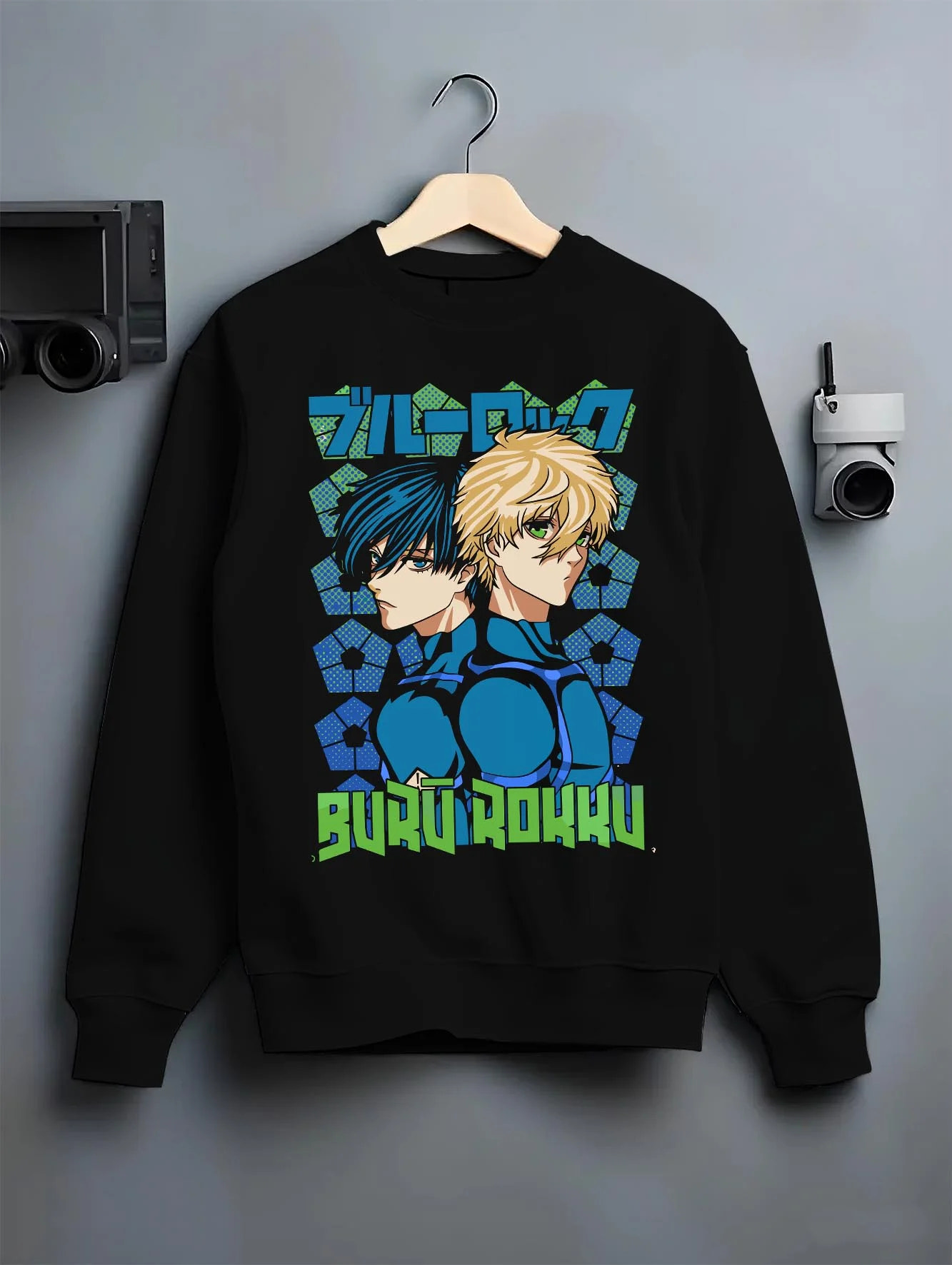 Black crewneck sweatshirt on hanger with Blue Lock Hoodie Isagi Bachira Duo Striker Forward graphic bold anime graphic.