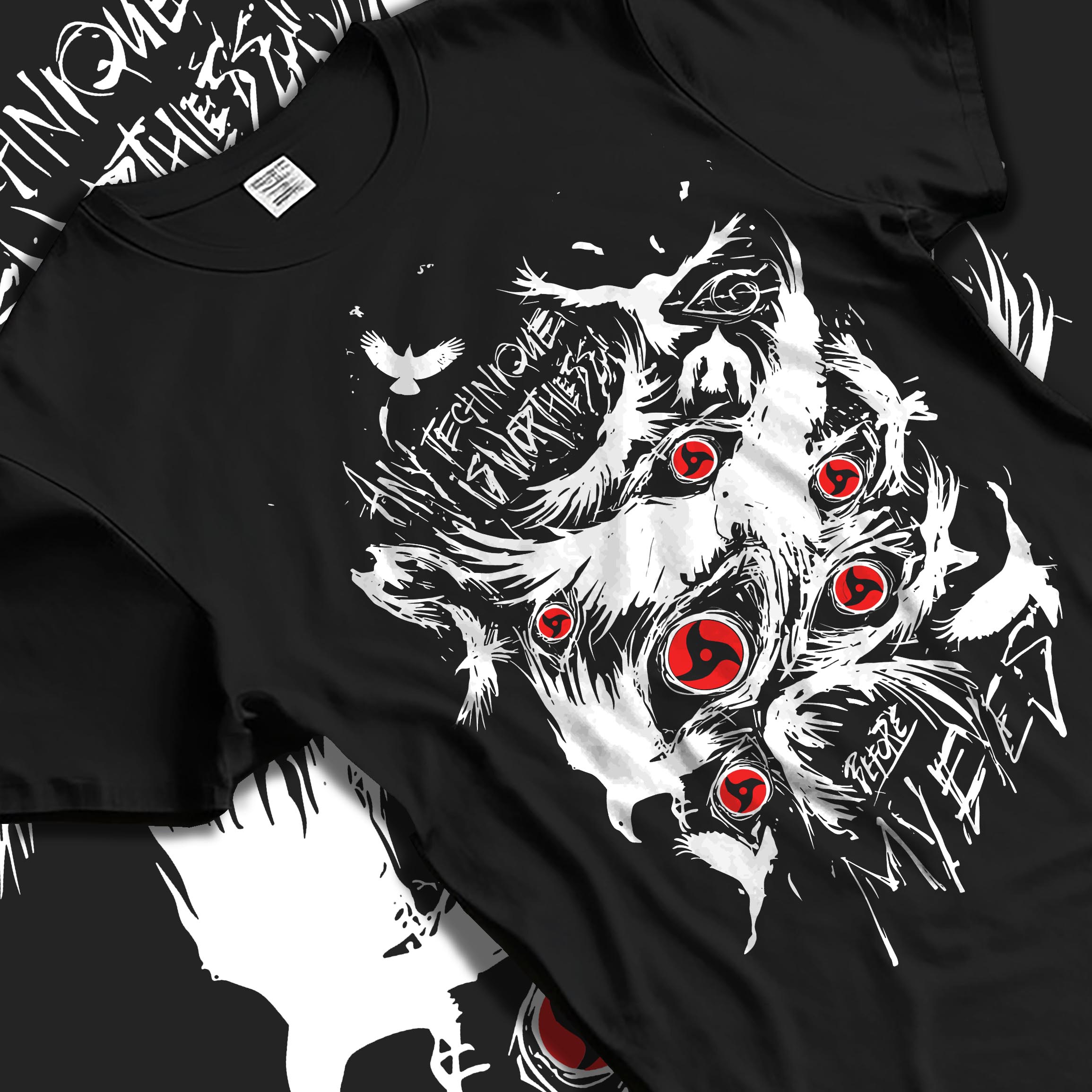 Black T-shirt laid flat with natural fabric folds, featuring Naruto Sharingan shonen battle character design with intense red eyes and dark manga panel style.