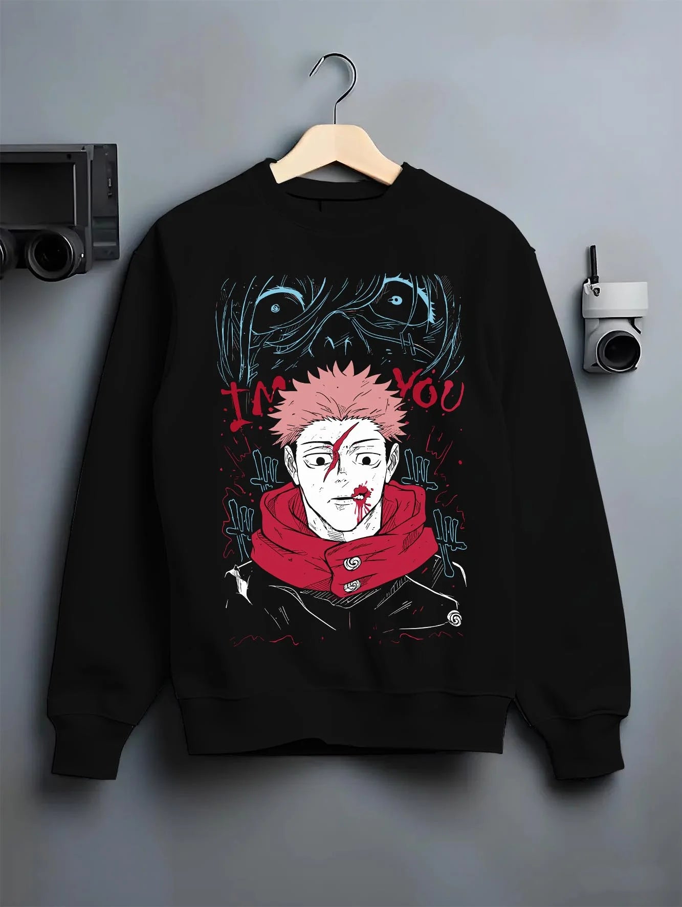 Black crewneck sweatshirt on hanger with Jujutsu Kaisen Hoodie Yuji Itadori Cursed Mark Jumper graphic premium wear.