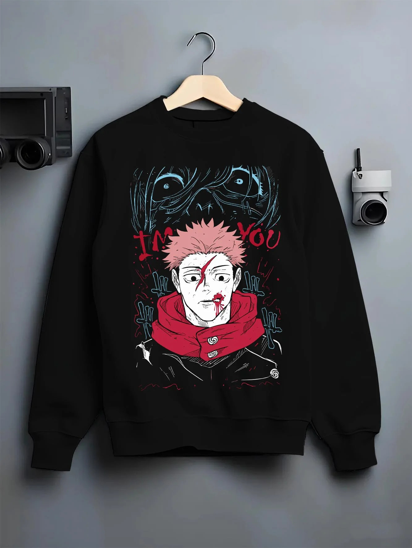 Black crewneck sweatshirt on hanger with Jujutsu Kaisen Hoodie Yuji Itadori Cursed Mark Jumper graphic premium wear.