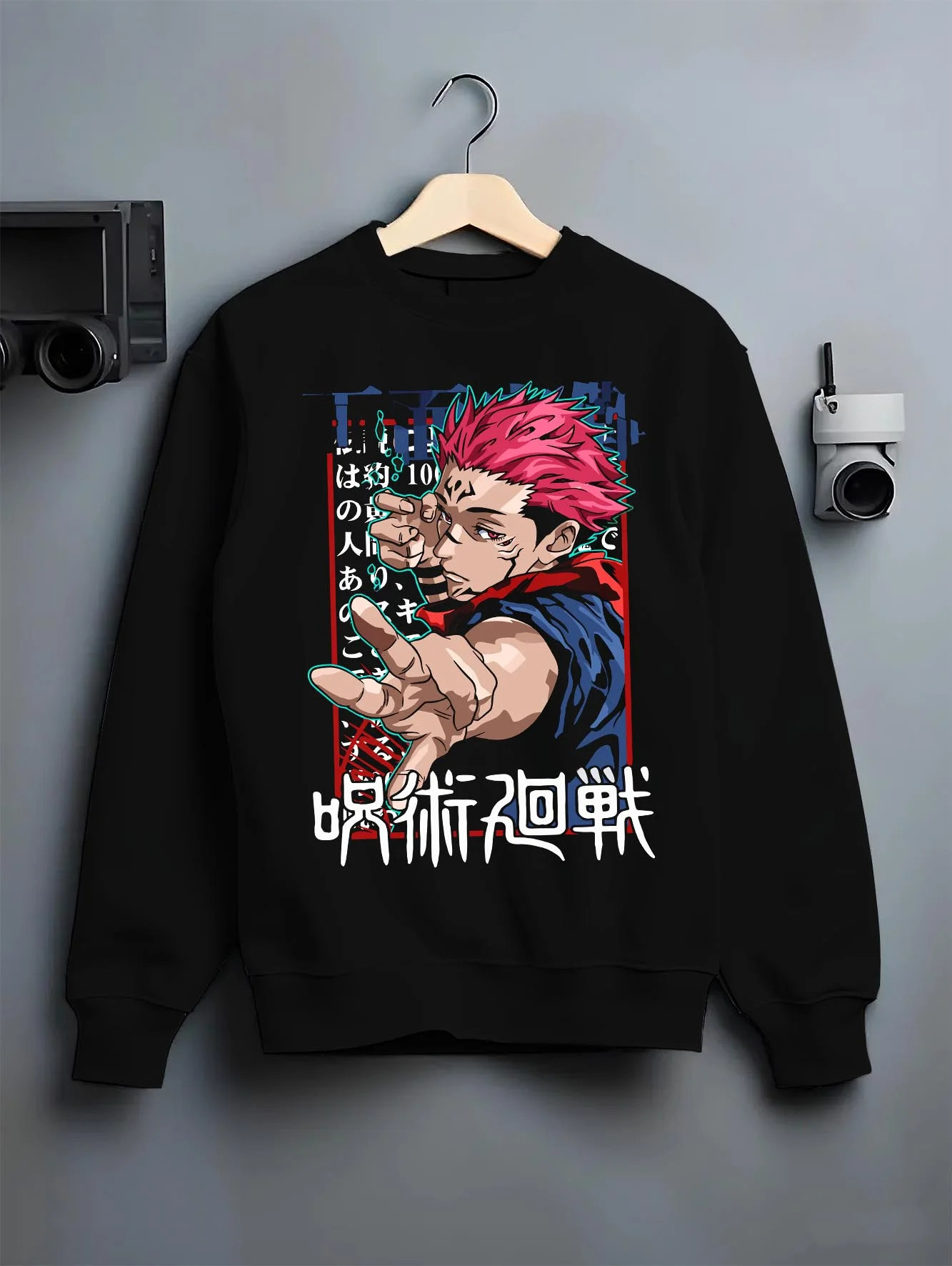 Black crewneck sweatshirt on hanger with Jujutsu Kaisen Hoodie Yuji Itadori Power Surge Jumper graphic premium wear.