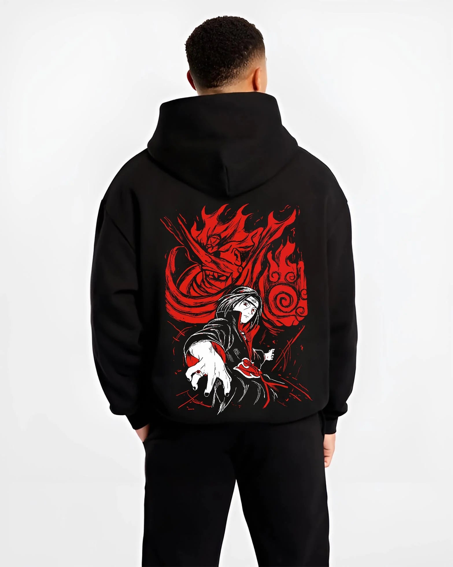 Black hoodie worn by male model, back view with Naruto Hoodie Itachi Uchiha Sharingan Power Jumper graphic streetwear graphic.