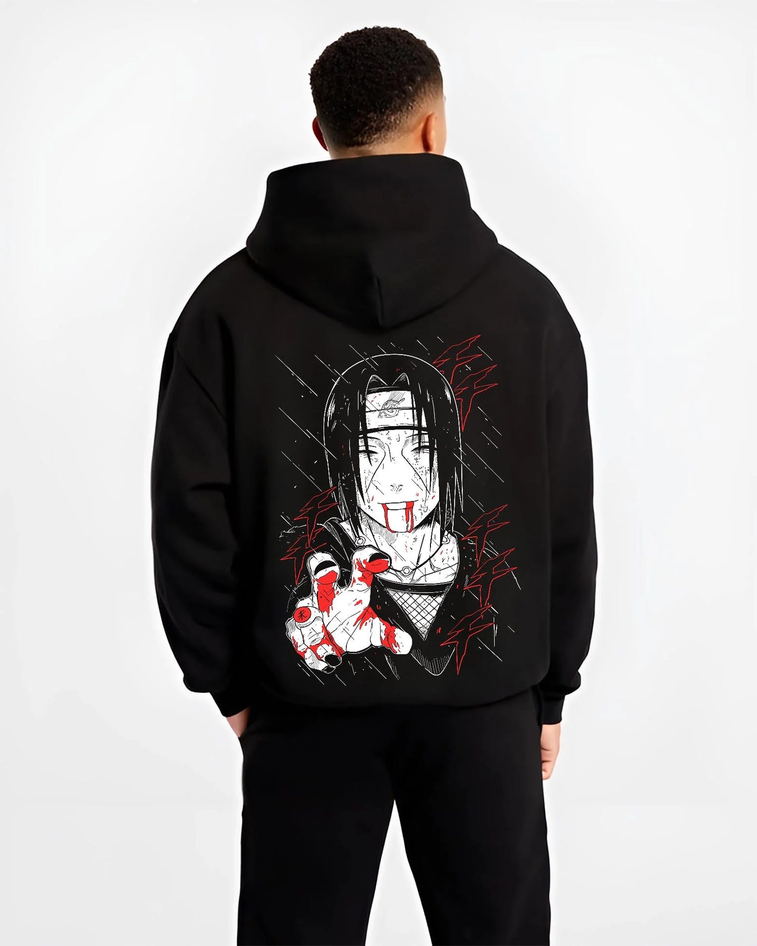 Black hoodie worn by male model, back view with Naruto Hoodie Itachi Uchiha Cursed Agent Jumper graphic bold anime graphic.