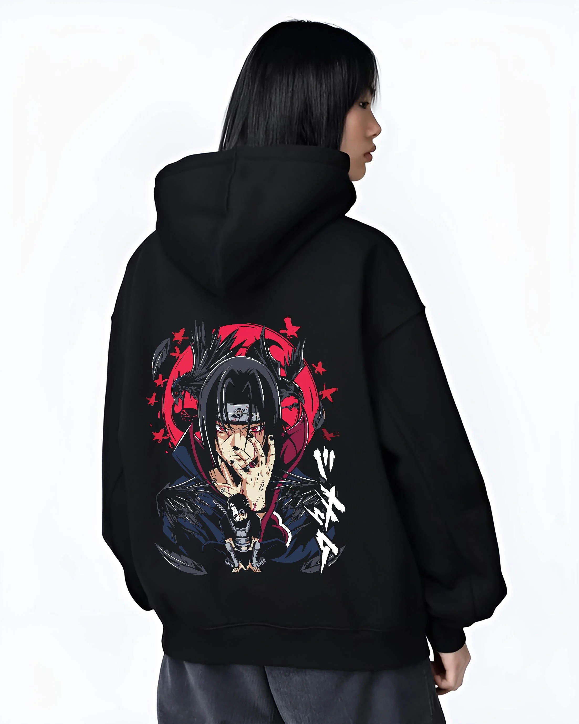 Black hoodie worn by female model, back view with Naruto Hoodie Itachi Uchiha Susanoo Spirit Jumper graphic bold anime graphic.