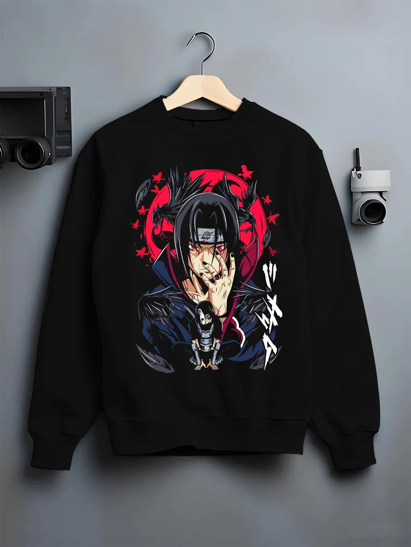 Black crewneck sweatshirt on hanger with Naruto Hoodie Itachi Uchiha Susanoo Spirit Jumper graphic streetwear graphic.