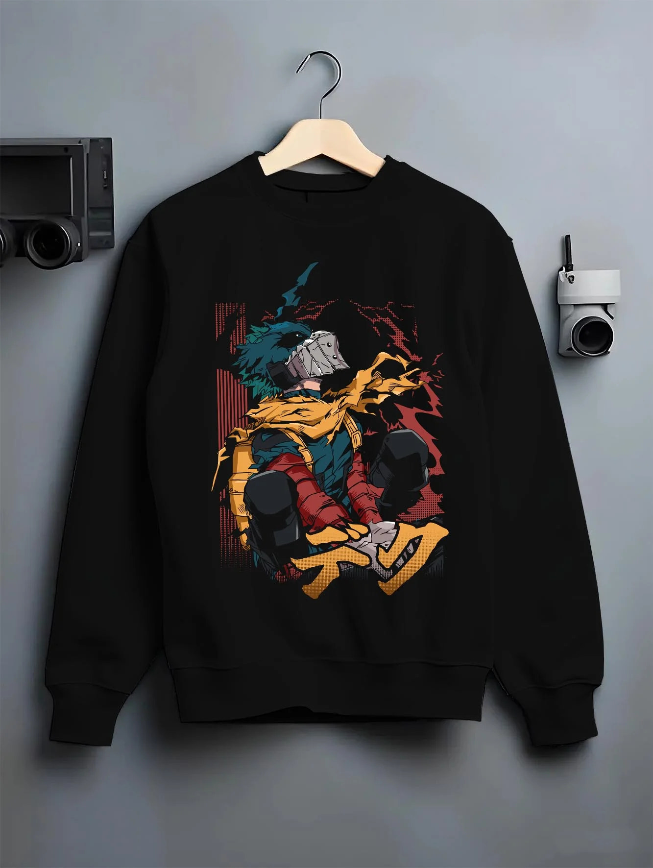 Black crewneck sweatshirt on hanger with My Hero Academia Hoodie Izuku Midoriya Hero Stance graphic bold anime graphic.