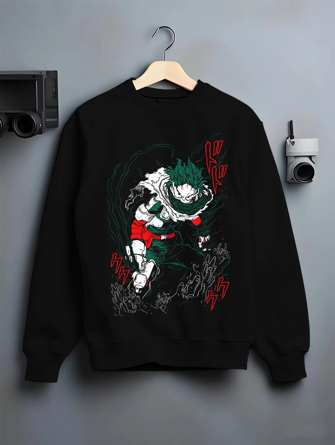 Black crewneck sweatshirt on hanger with My Hero Academia Hoodie Izuku Midoriya Plus Ultra graphic bold anime graphic.